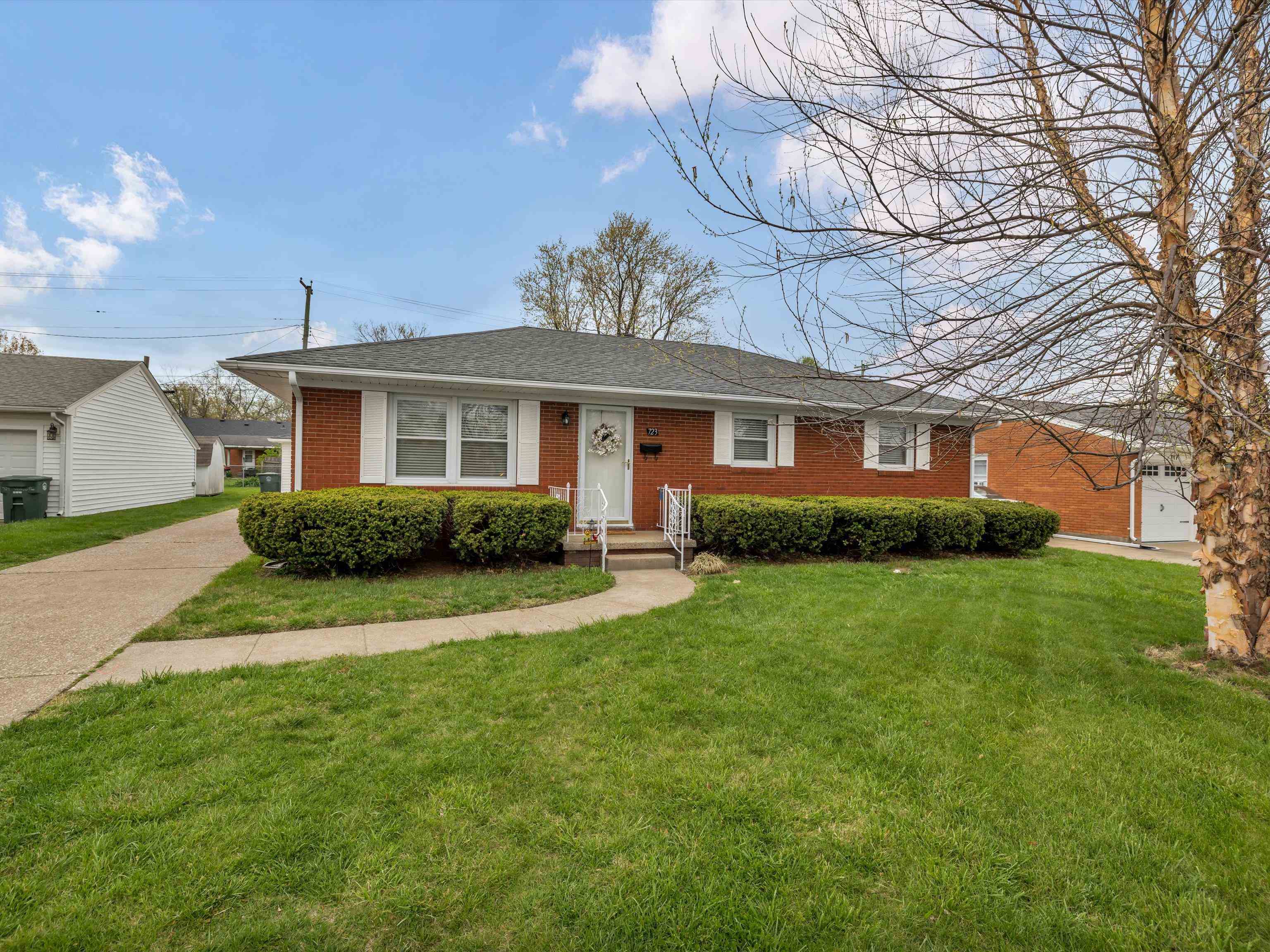 Front of Home with Sidewalk leading to Home