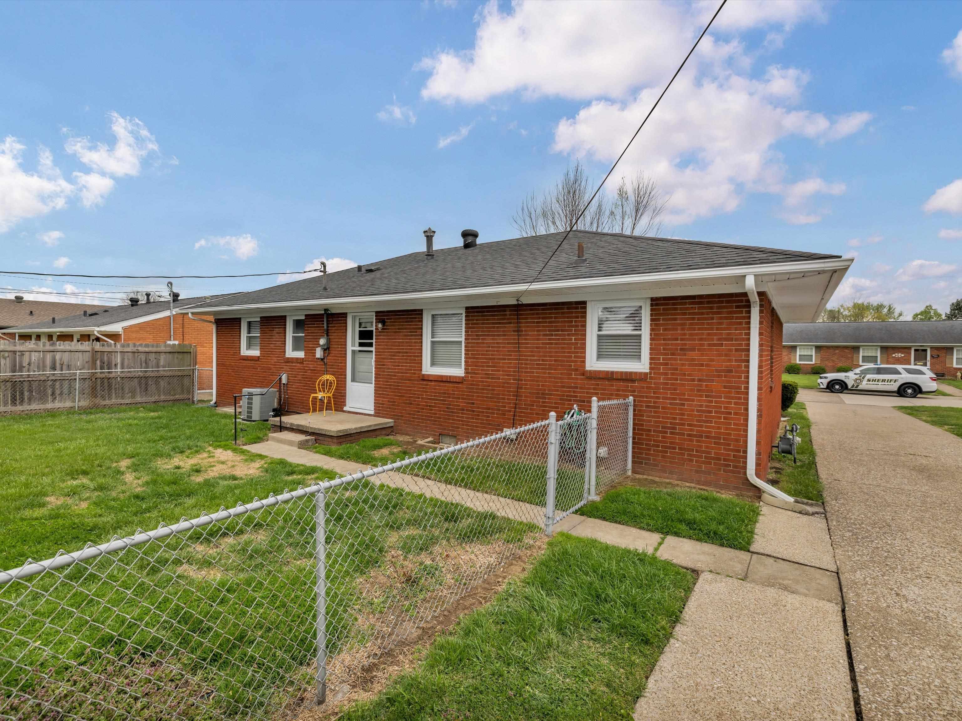 Side Angle of Back of home and fenced yard