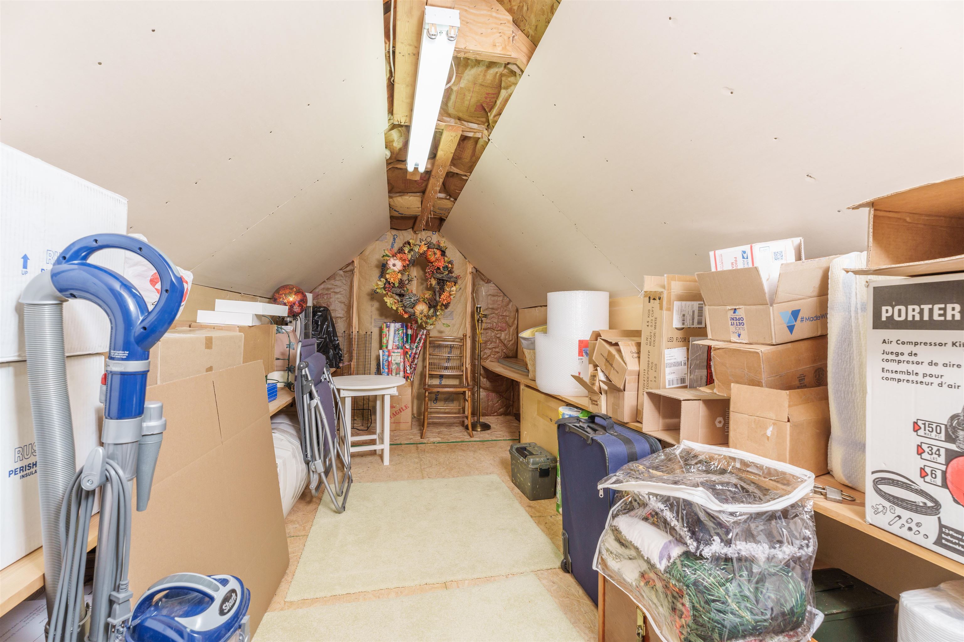 Partially finished attic for all your holiday storage needs & more.
