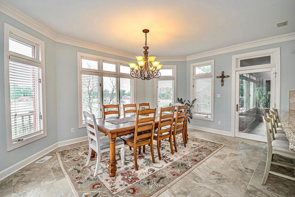 The kitchen dining area accommodates a large table and the opportunity to enjoy the views!