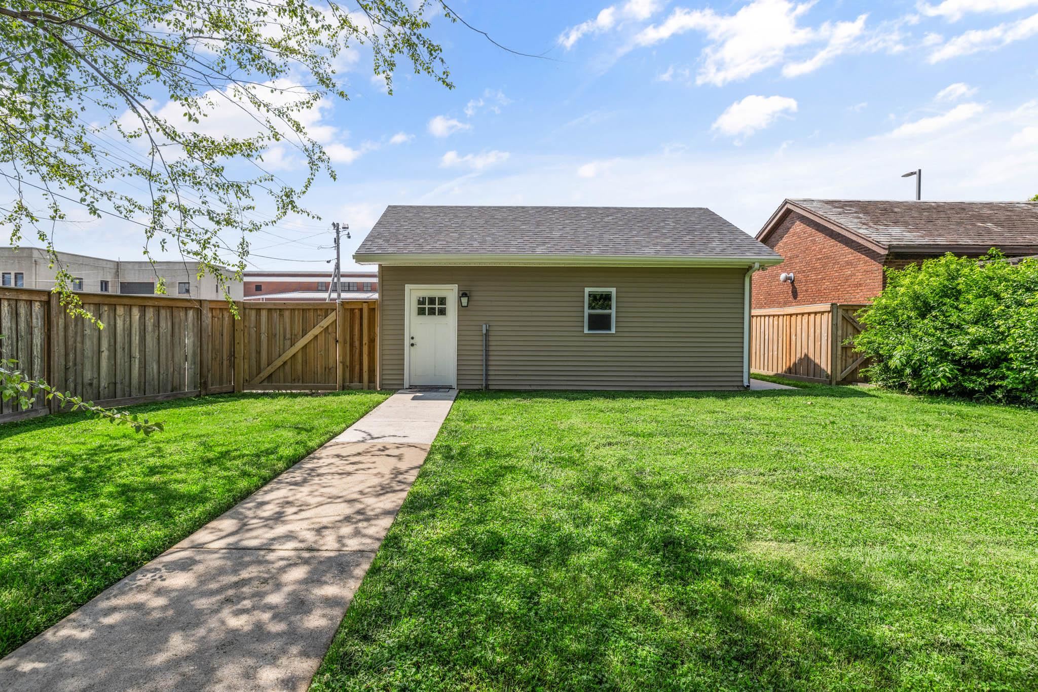 Private entrance to 2 car garage.  Large gate opening.
