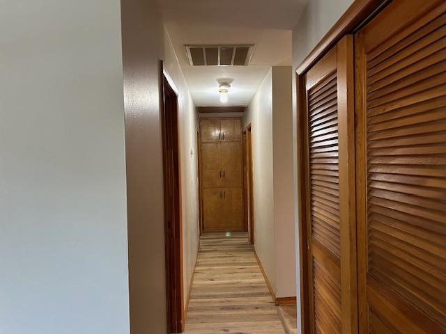 You'll love the built-ins at the end of the hallway!  Great storage!