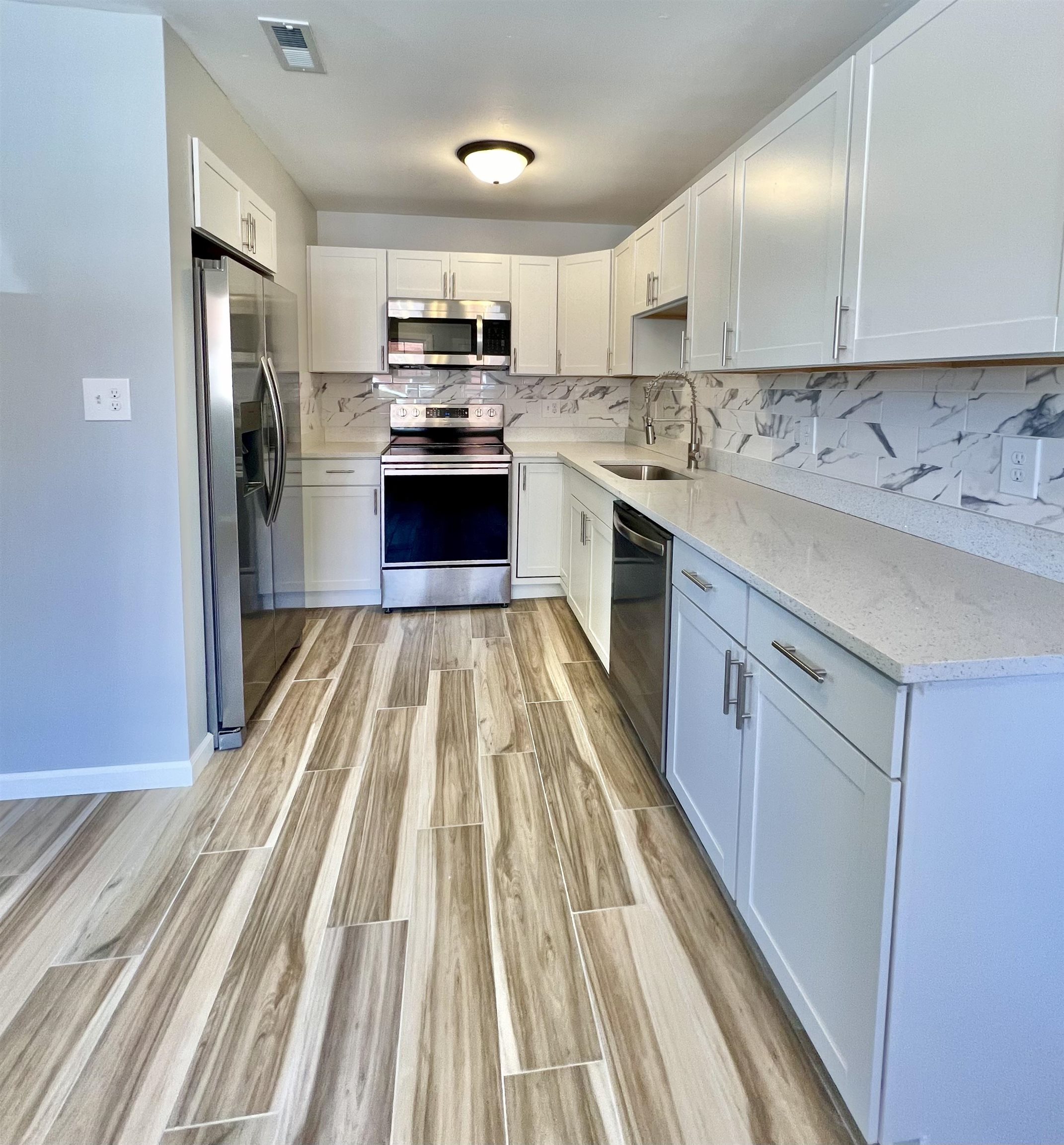 Granite, new cabinets and new stainless steel appliances