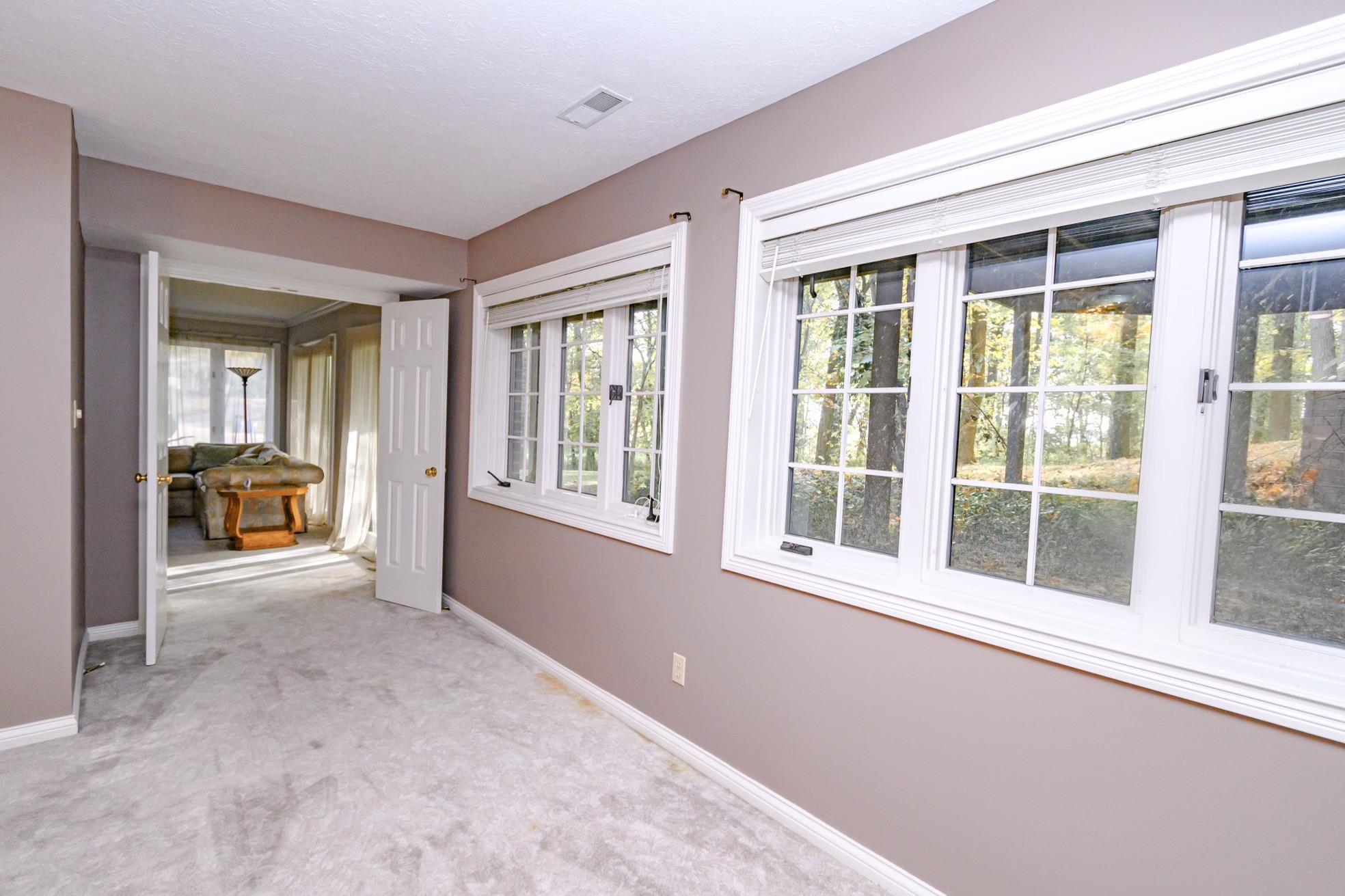 This Large Bedroom has been painted in October -  great Light from the windows- Could be a game room