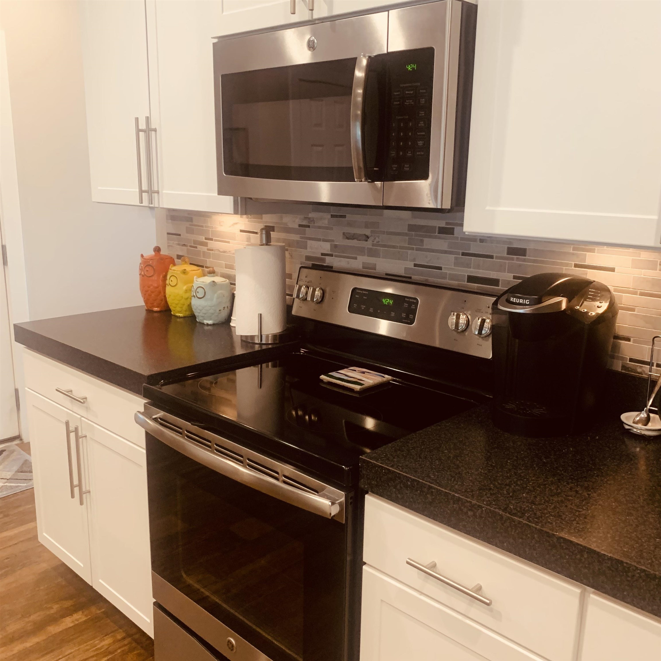 Beautiful white cabinets to help lighten the room.