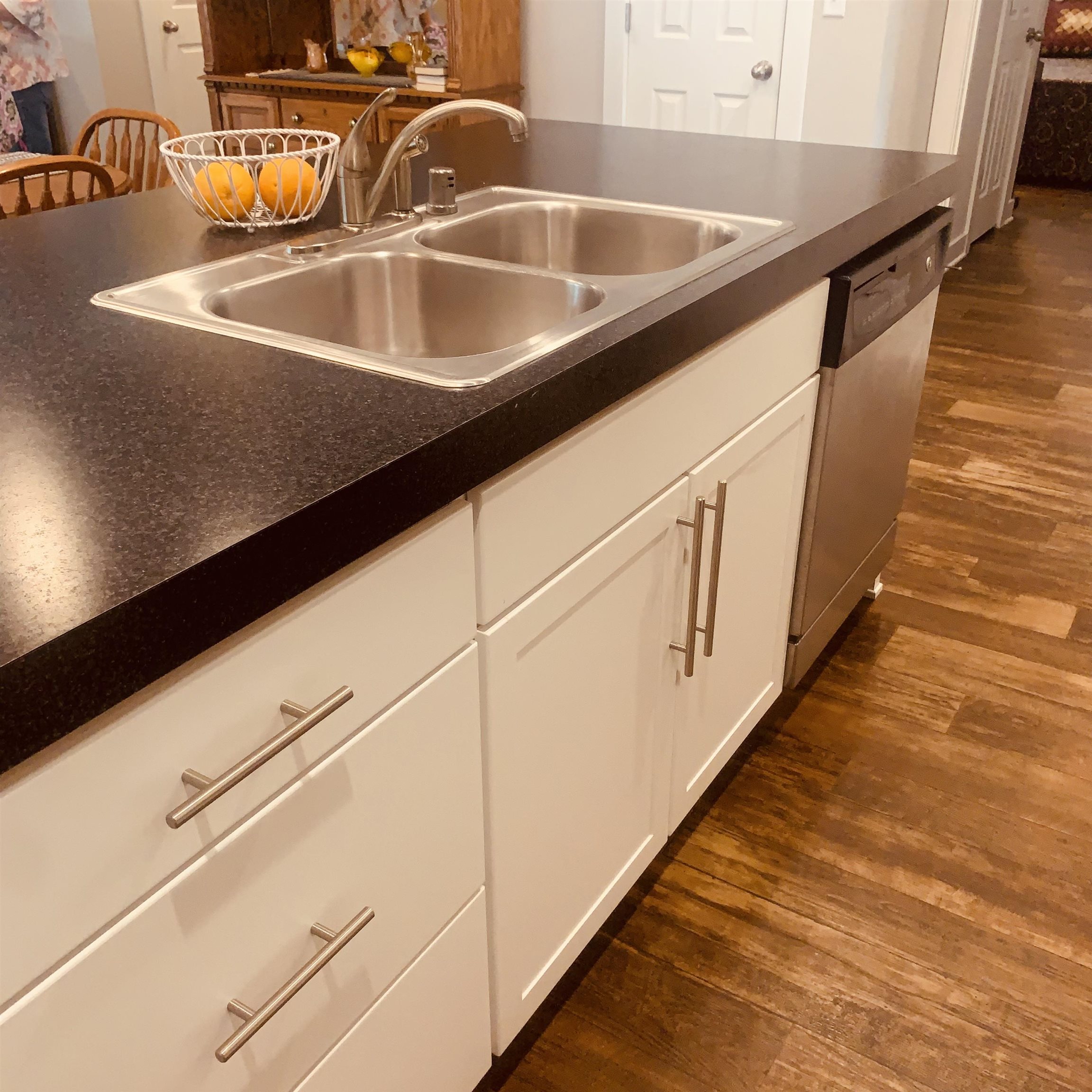 Bar with sink and dishwasher. Two barstools included