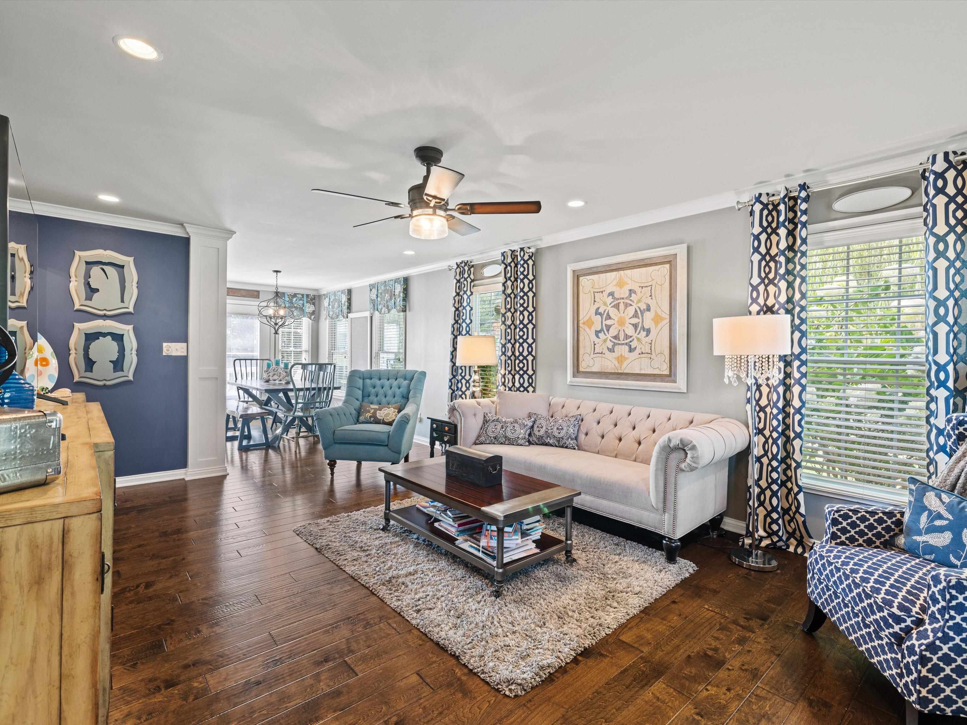 Living Room opens to the kitchen and dining room for extended seating and visiting.