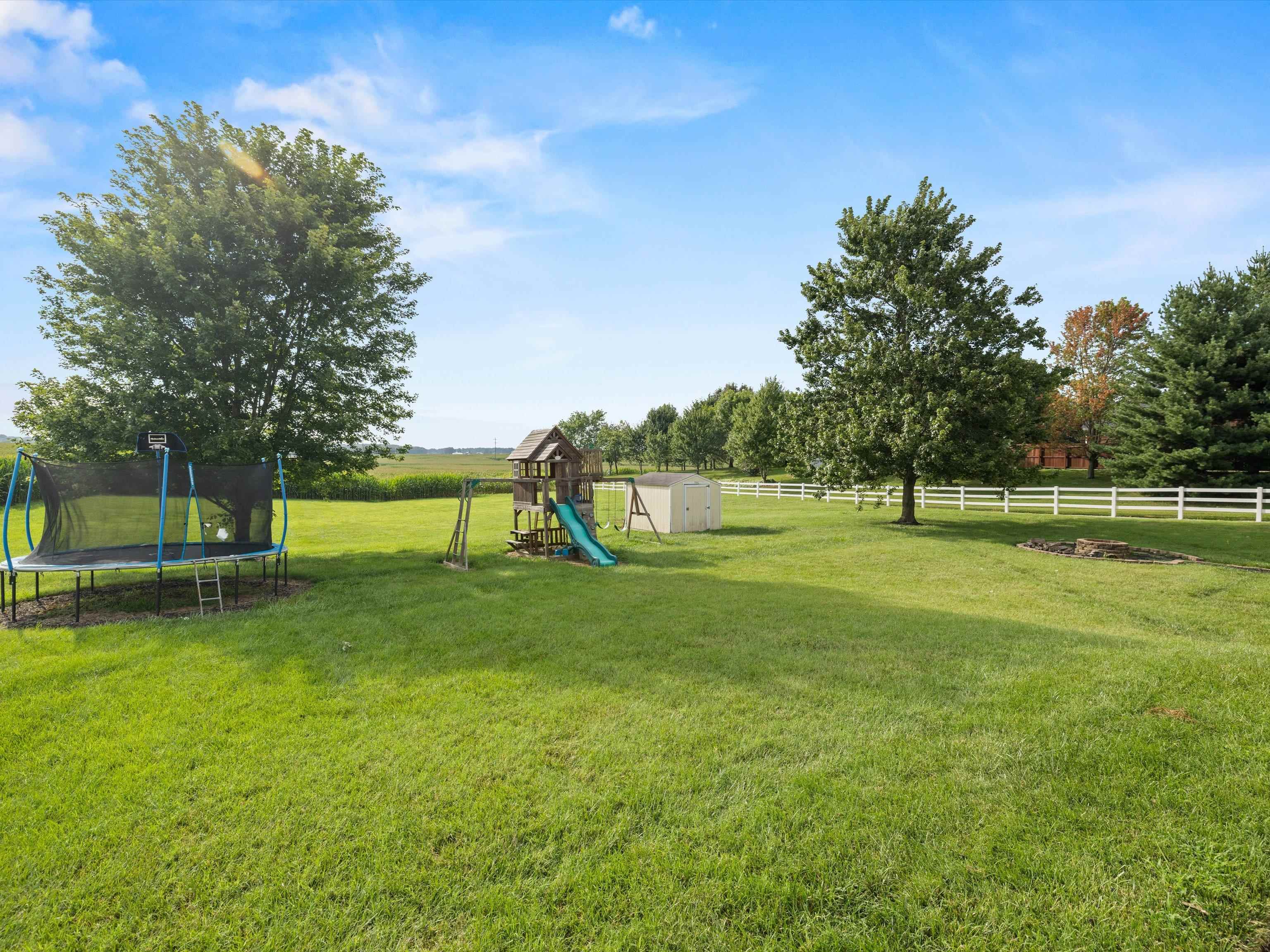 Since this house sits on an acre, there is plenty of back yard to enjoy!
