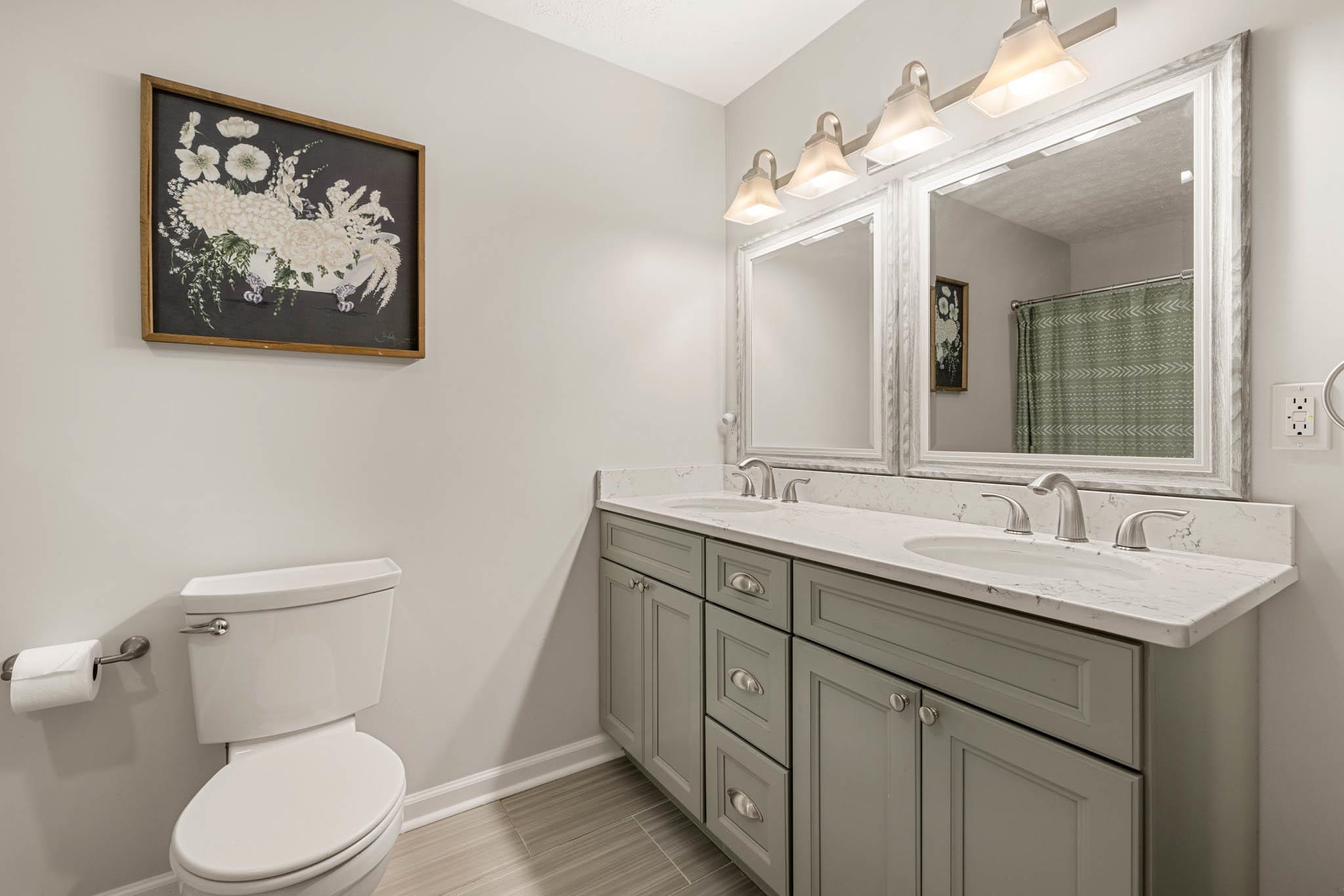 Double sink, ceramic tile flooring