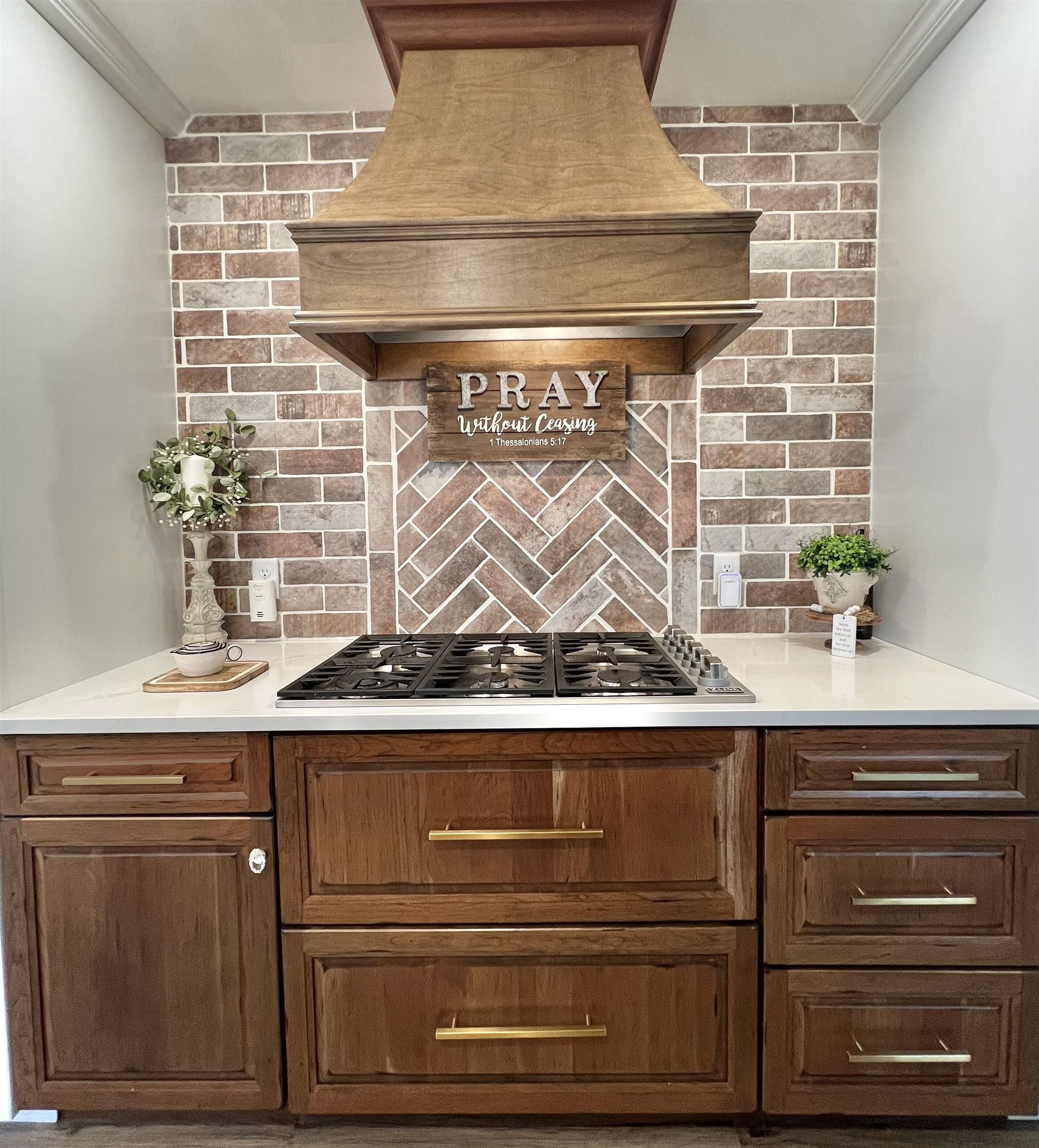 Gas Stove top, custom-made overhead vent hood.