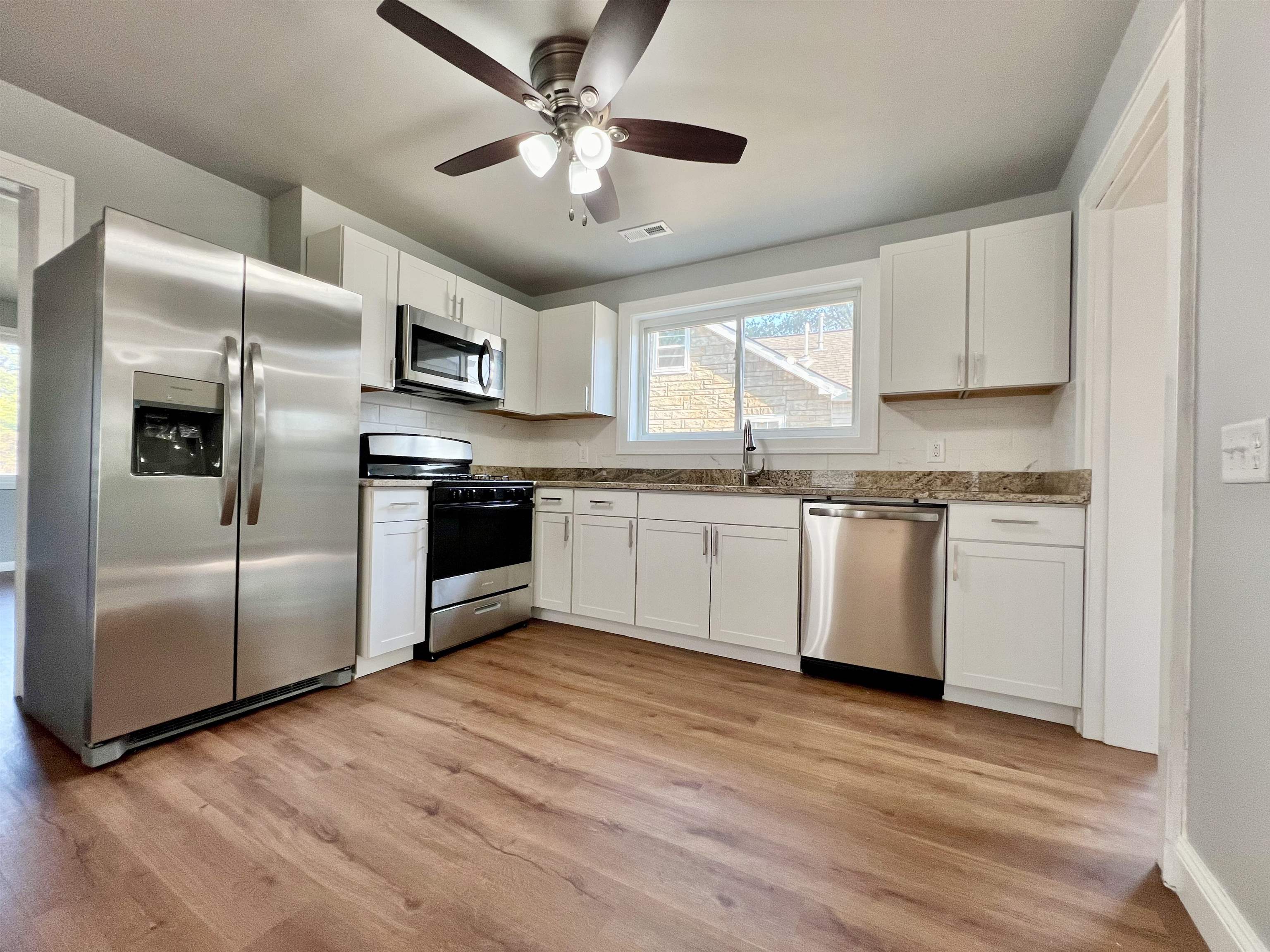 New cabinets, granite countertops, new appliances.