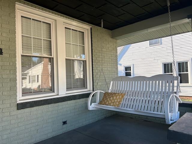 Everyone loves a porch swing!  Enjoy the fall weather on the front porch!
