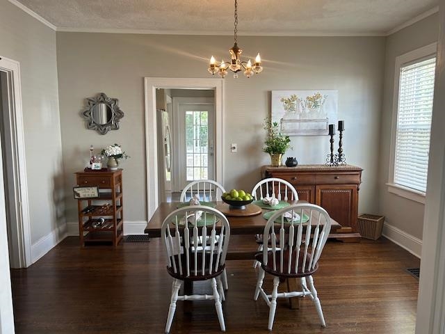 Large dining room with vintage chandelier, hardwood floors and lots of room for decorative furniture