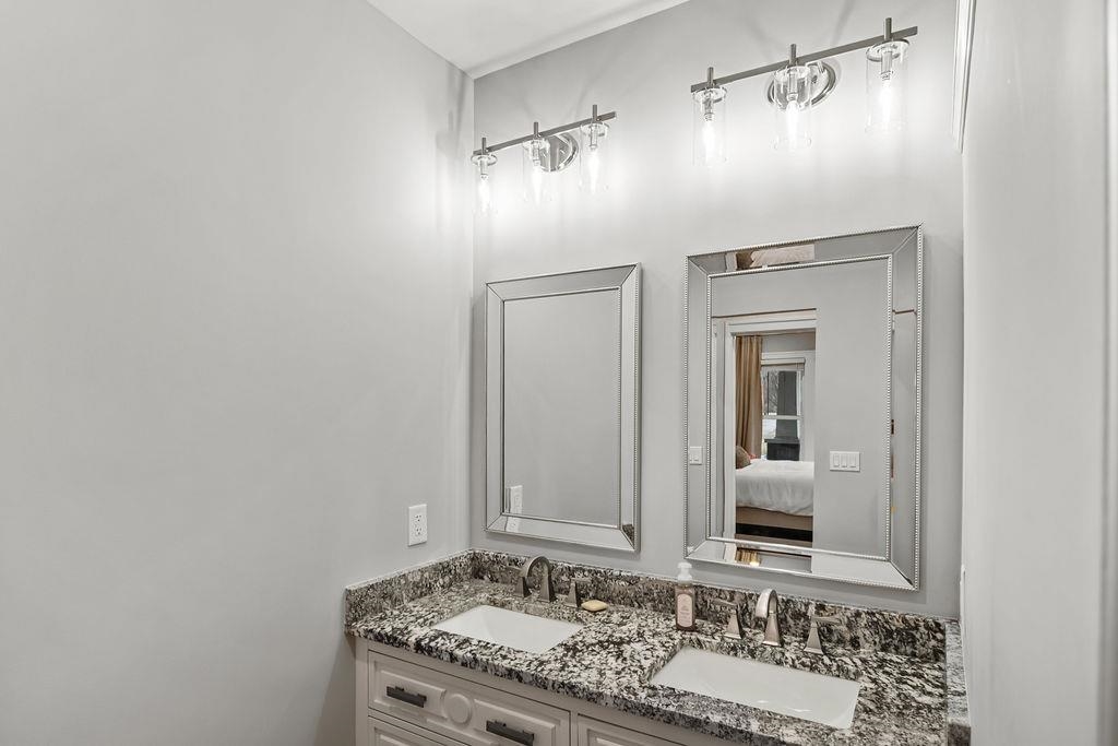 Check out the custom vanity with granite tops!