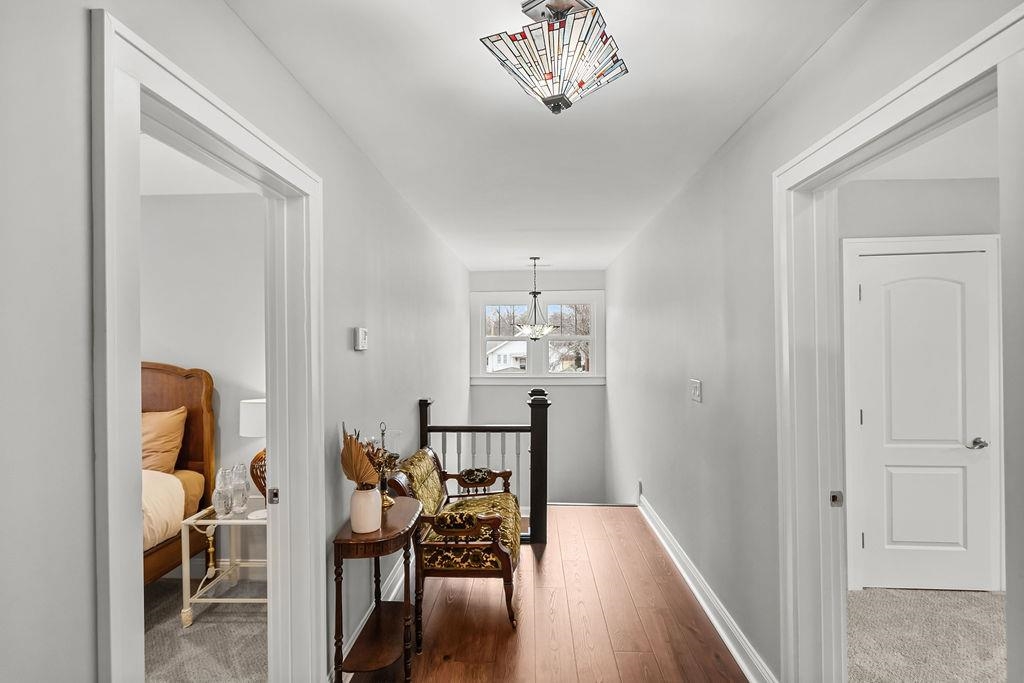 Cozy upstairs landing with hardwood floors!