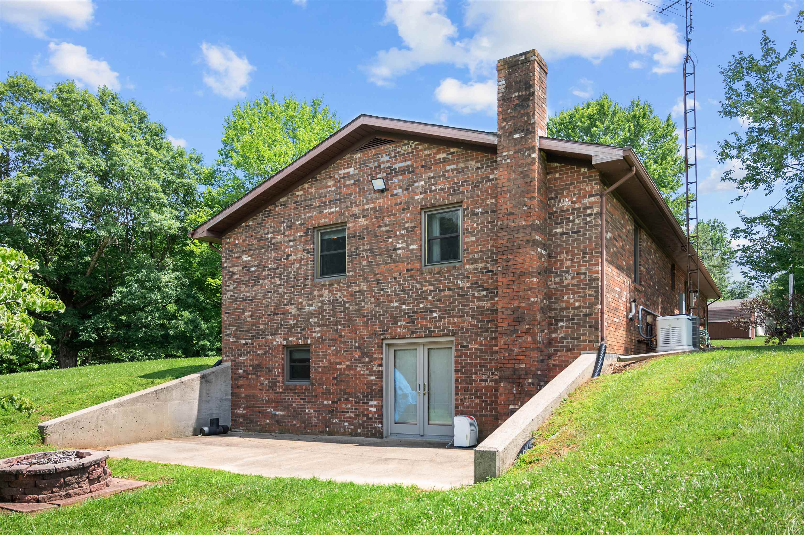 Walk out basement area with patio for entertaining. Triple lock french doors.