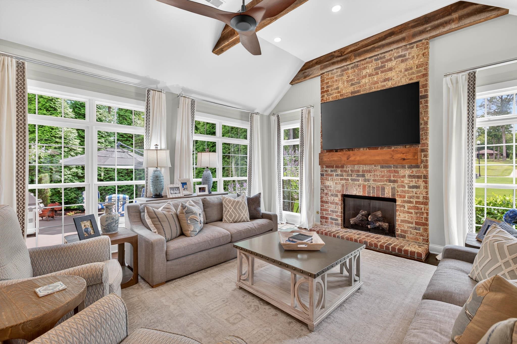 Soaring Ceilings, Engineered Hardwood Flooring, Gas Fireplace, Floor-to-Ceiling Windows