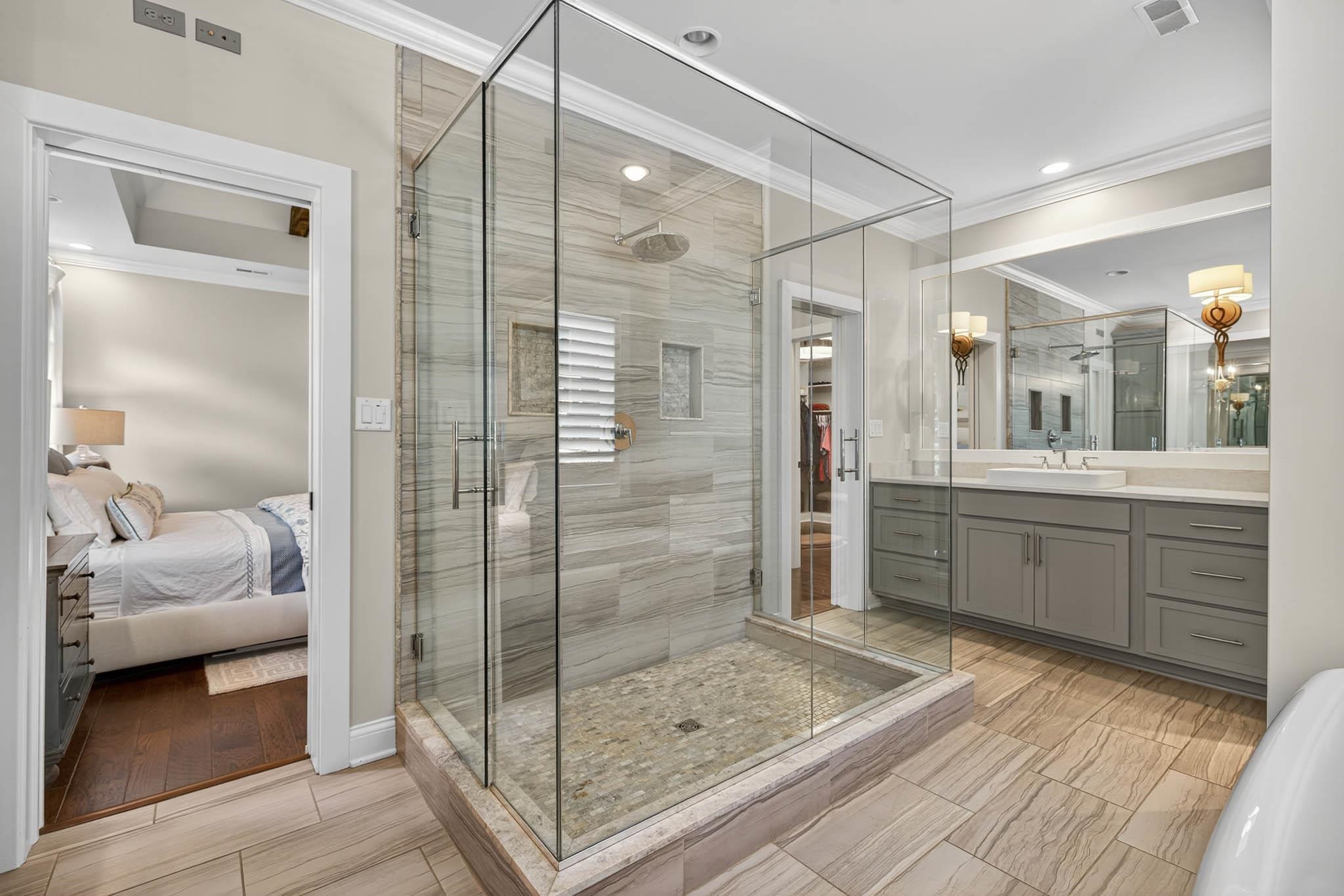 Walk-in Tiled Shower, Garden Tub, Dual vanities, Private water-closet