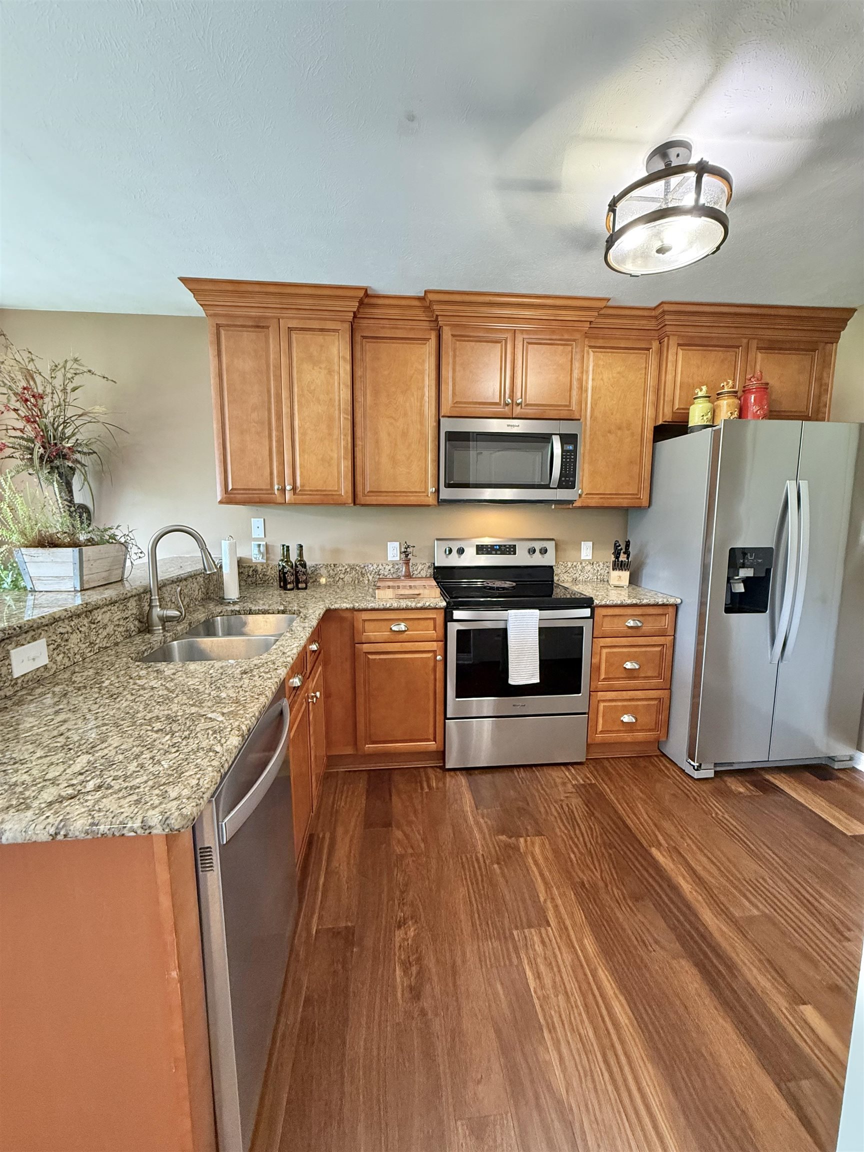 Updated countertops, appliances, and cabinets.