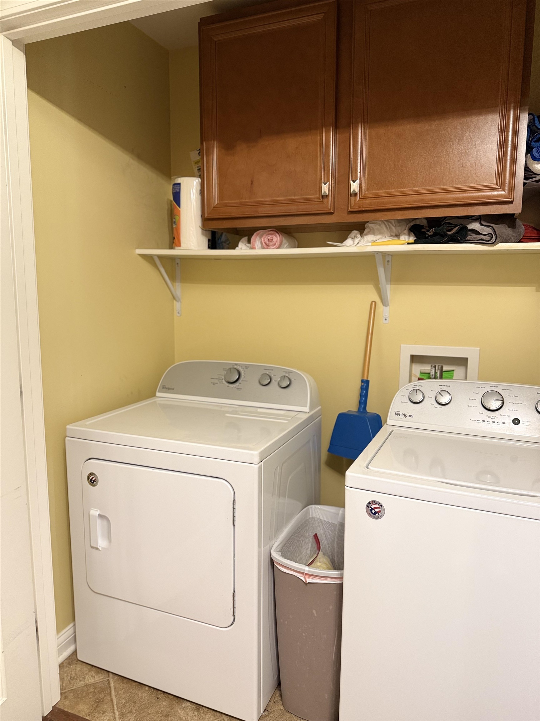 Located by garage door in kitchen