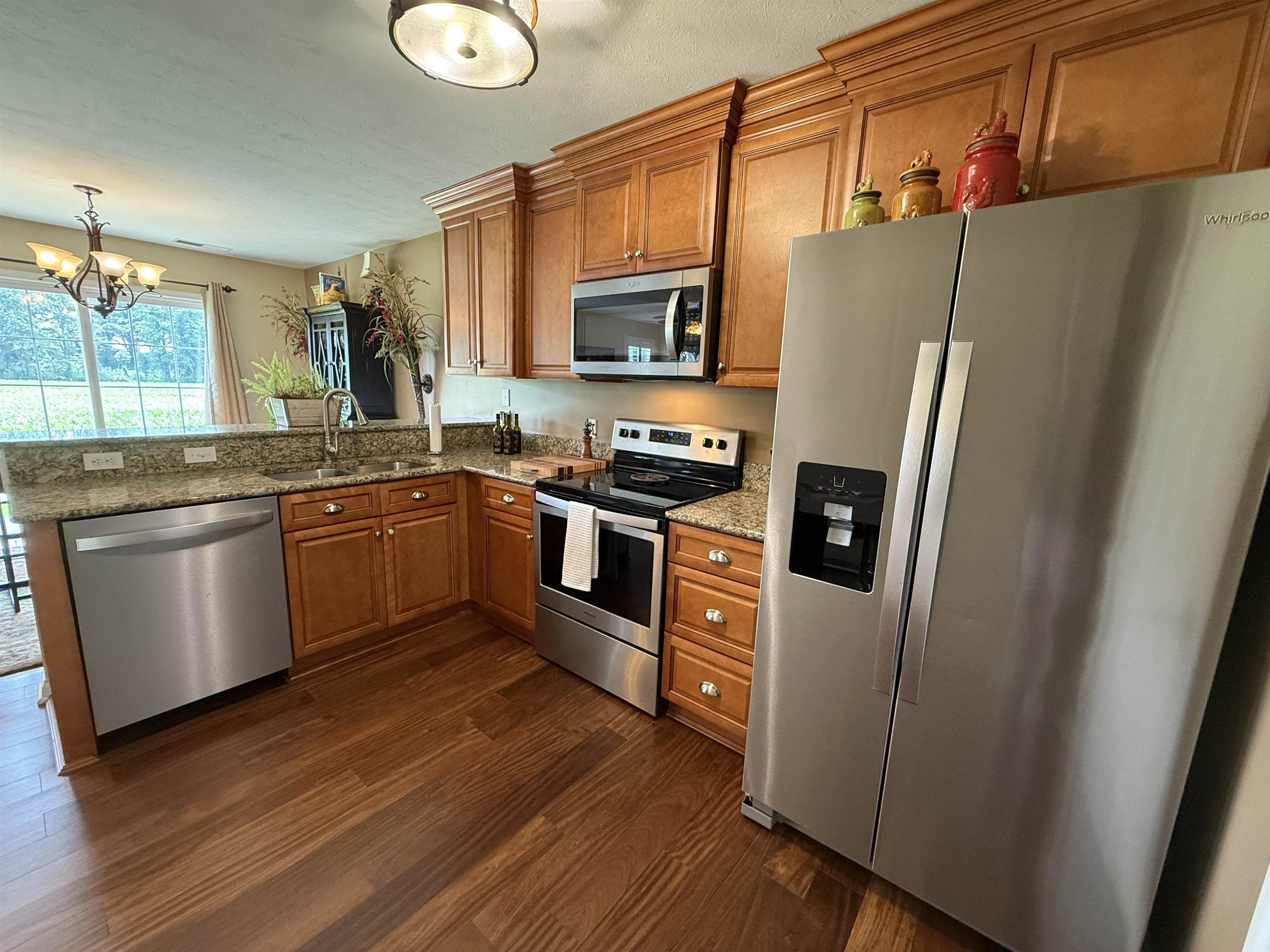 Open concept allows you to enjoy the backyard view from your Kitchen sink.