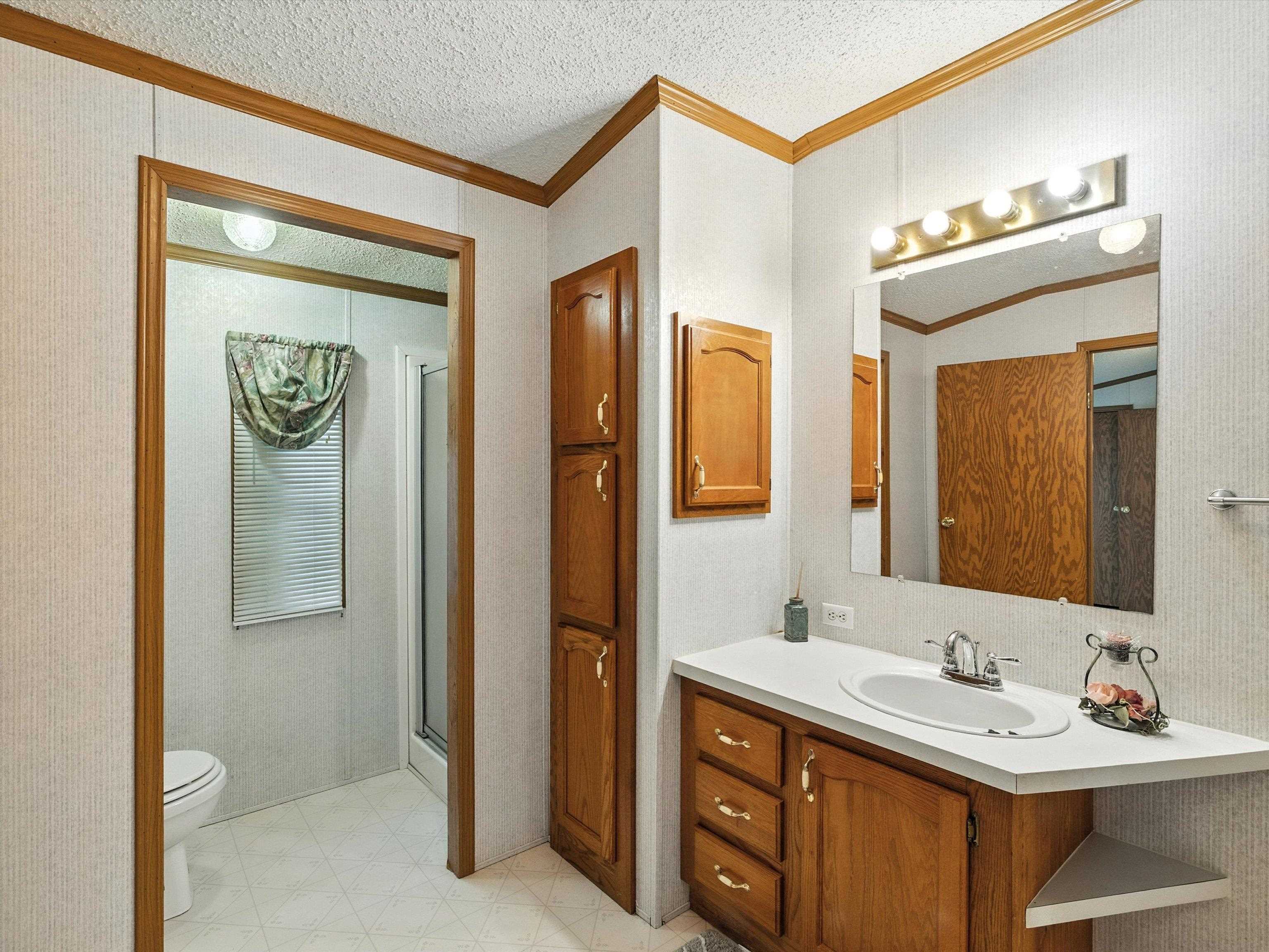 Privacy wall for potty + Storage cabinet for linens