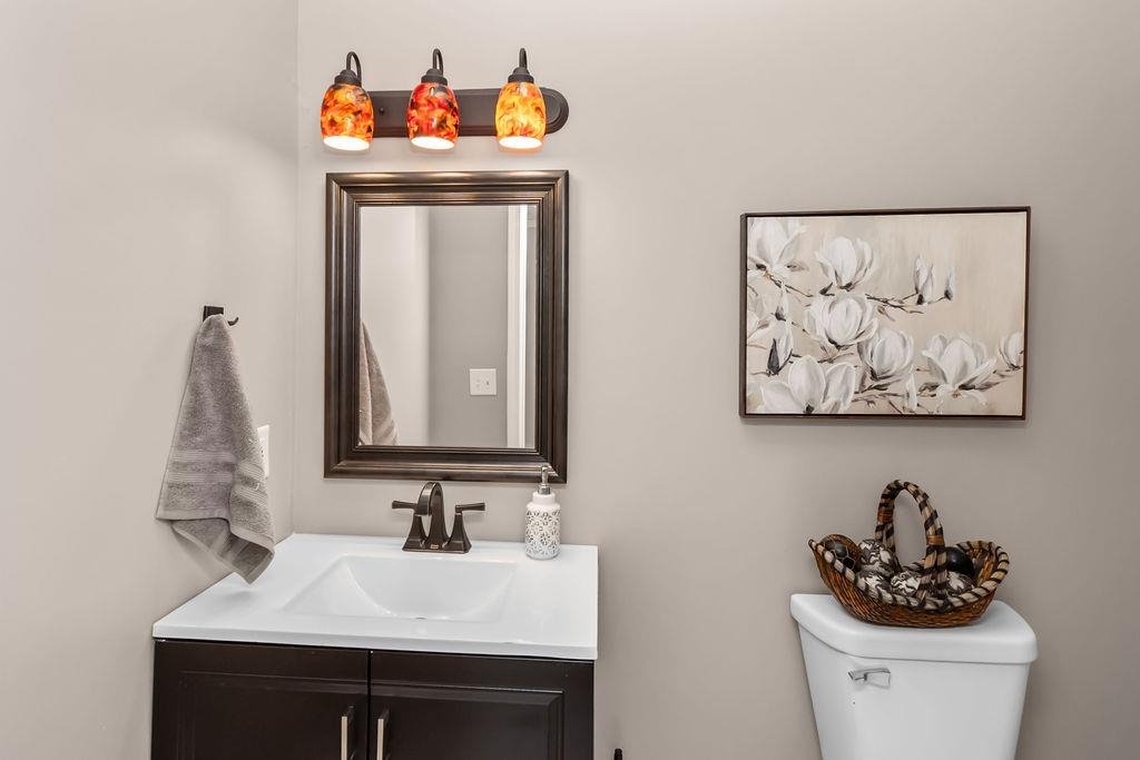 Powder room off the kitchen is perfect for guests