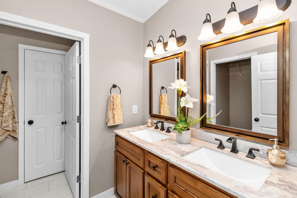 New double vanity with undermount bowls, new lights and mirrors.