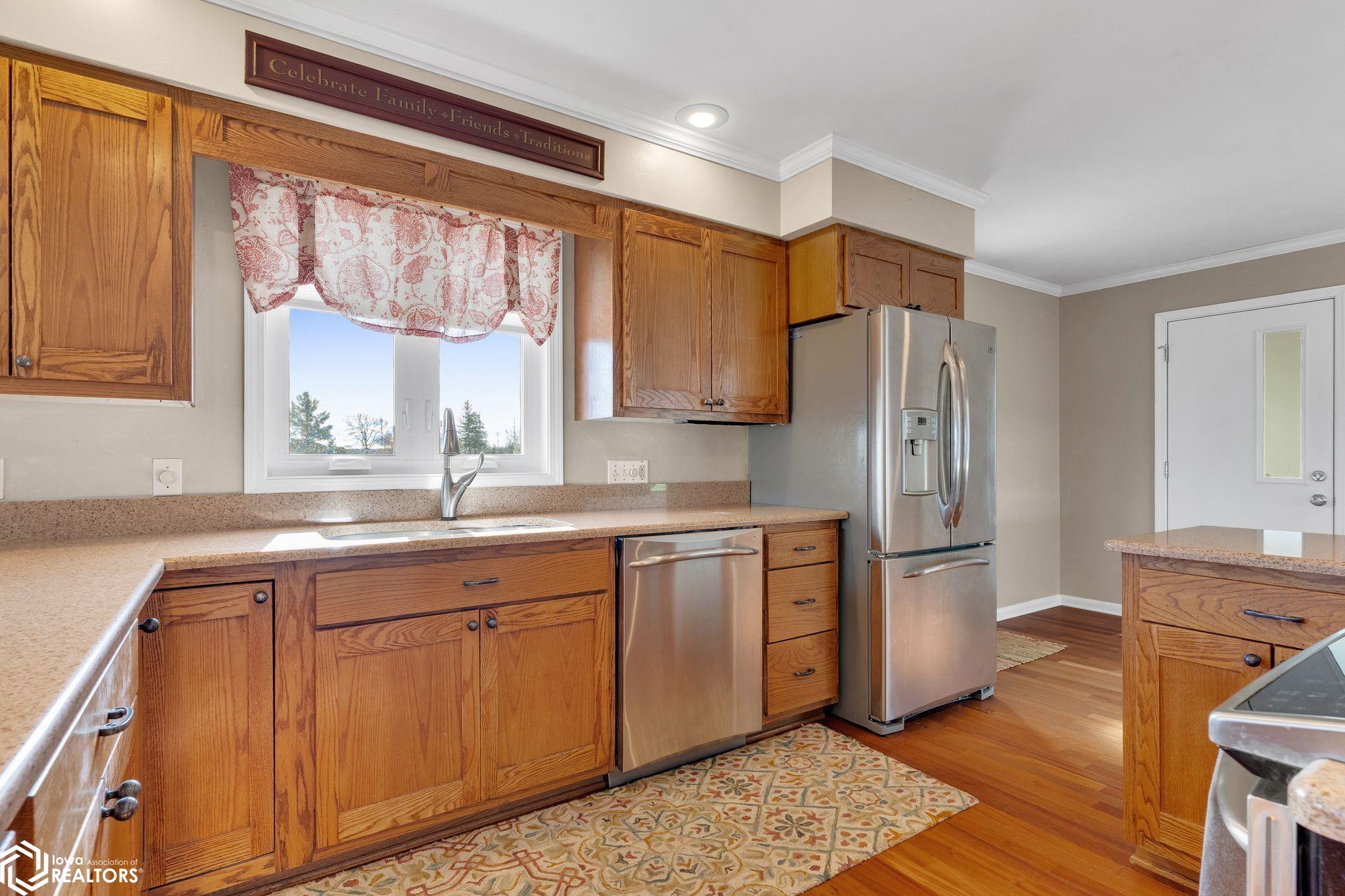 Kitchen featuring granite countertops and stainless steel appliances