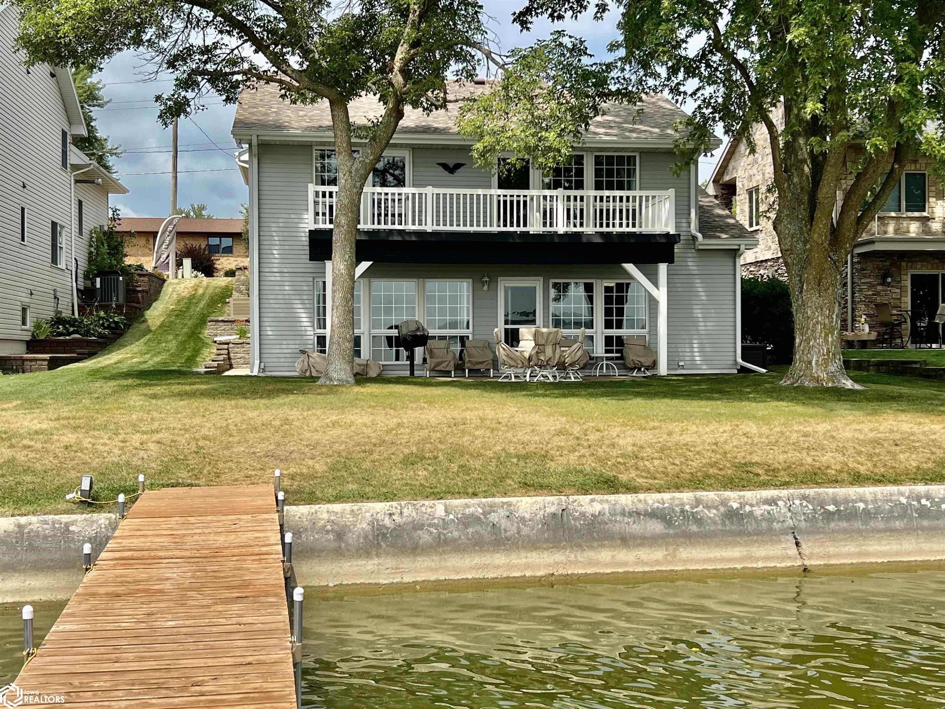 First time on the market! 60' OF LAKESHORE!! The opportunities are endless when it comes to this well built, well maintained lakeshore home! Enjoy all the amenities with entry level dock access, gorgeous lakeview, and open concept living with walk out lower level. This unique home features 3 massive bedrooms, 2 bathrooms, and an oversized single garage with 5 extra off street parking spots which is a rare for North Shore! Call your Realtor today and schedule your personal showing soon!