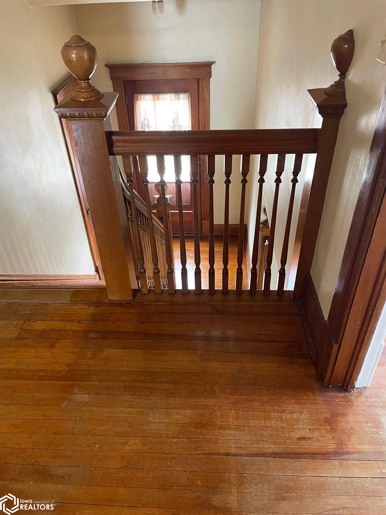 View of the stately staircase looking from the upstairs W.