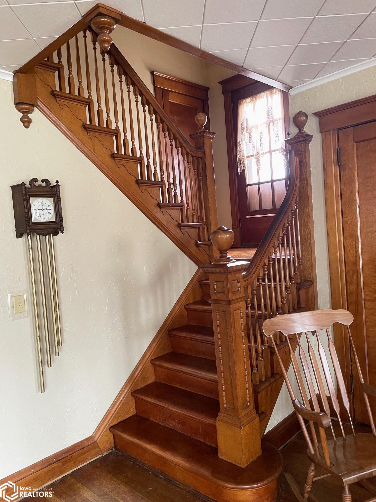 Another view of the stately staircase that leads upstairs to 4 bedrooms and a full bath.