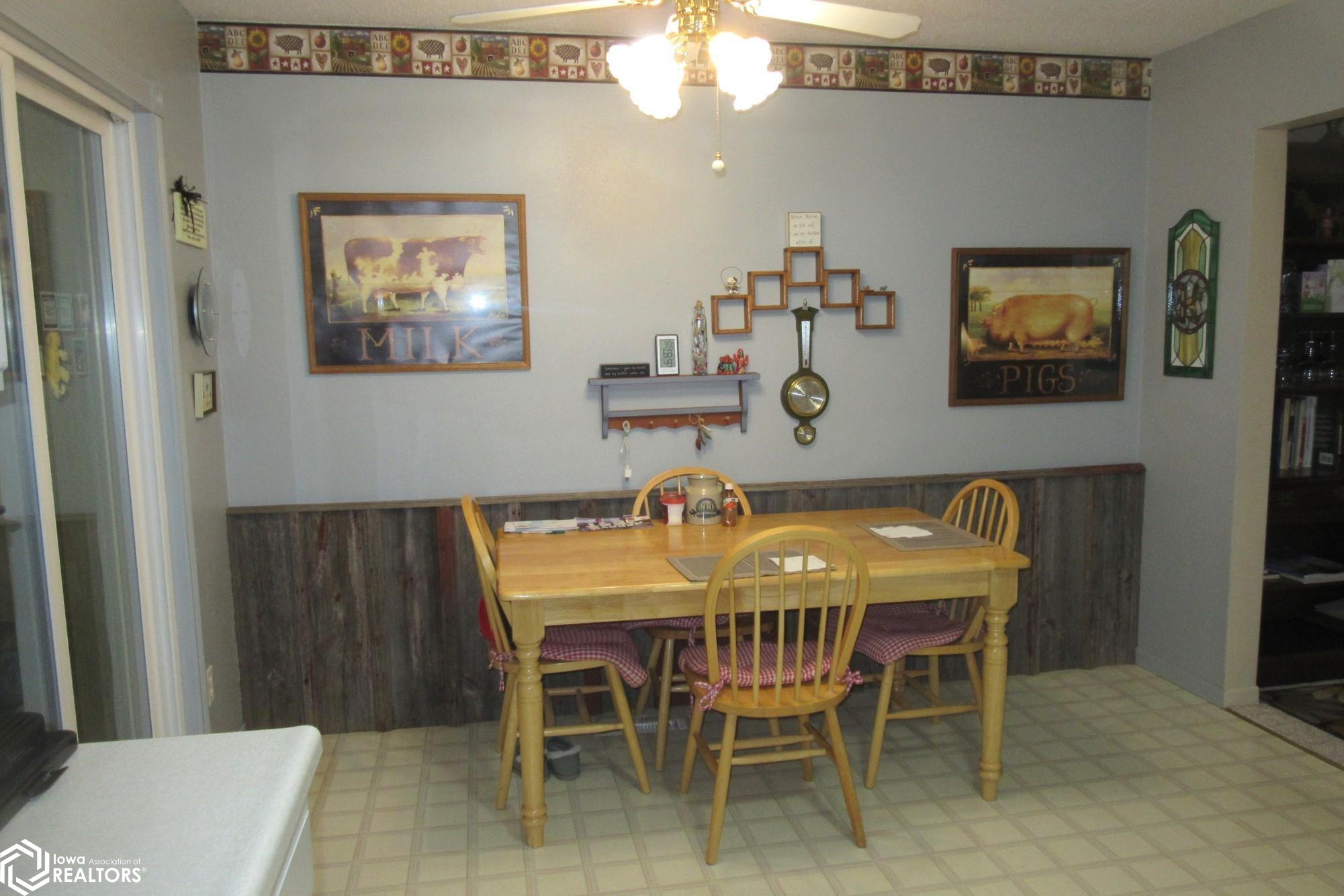 Open to Kitchen and also dble opening to Living Room.   Barn Siding in Dining Room for personality!