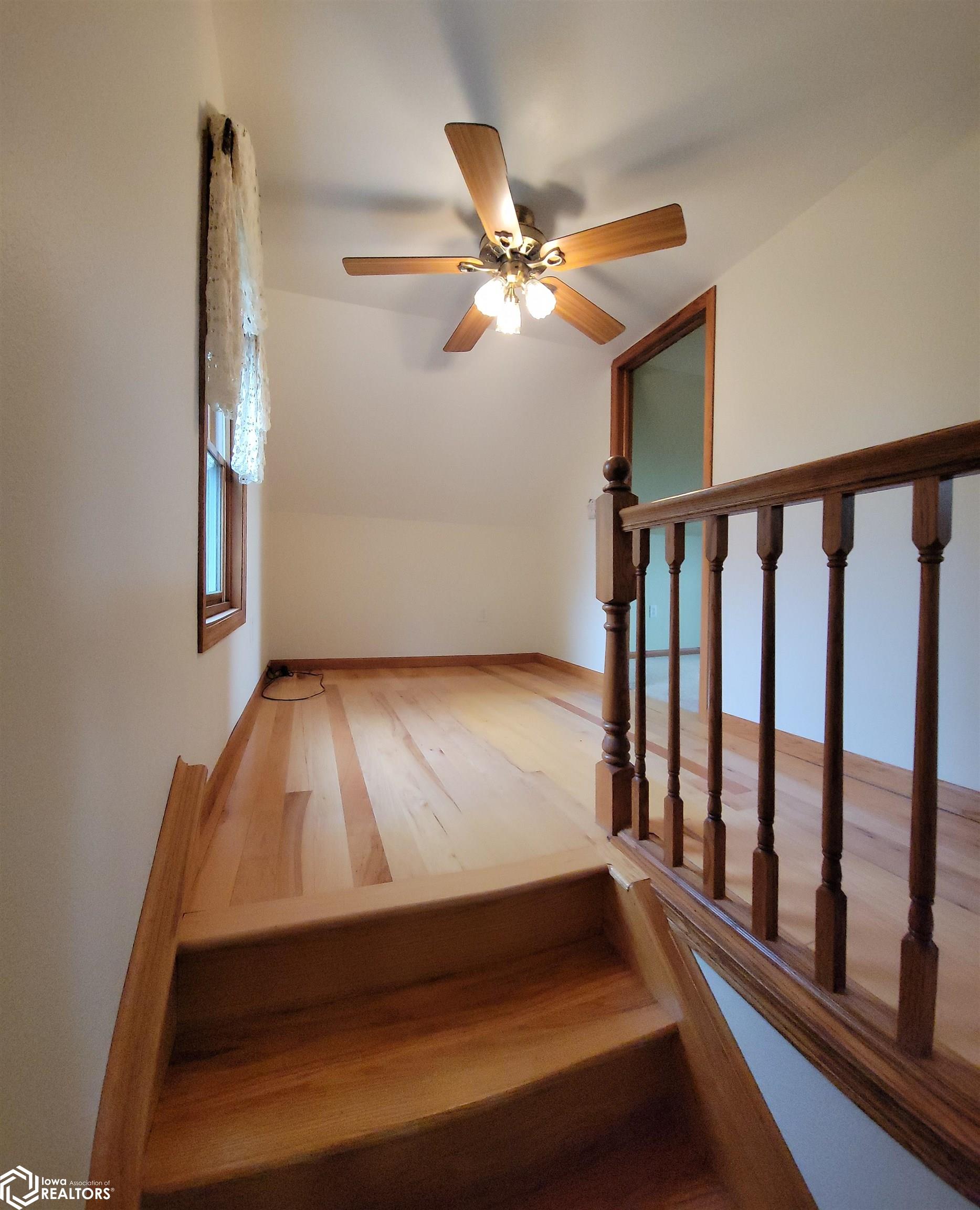 The upstairs hall has room for a small reading nook or office area.
