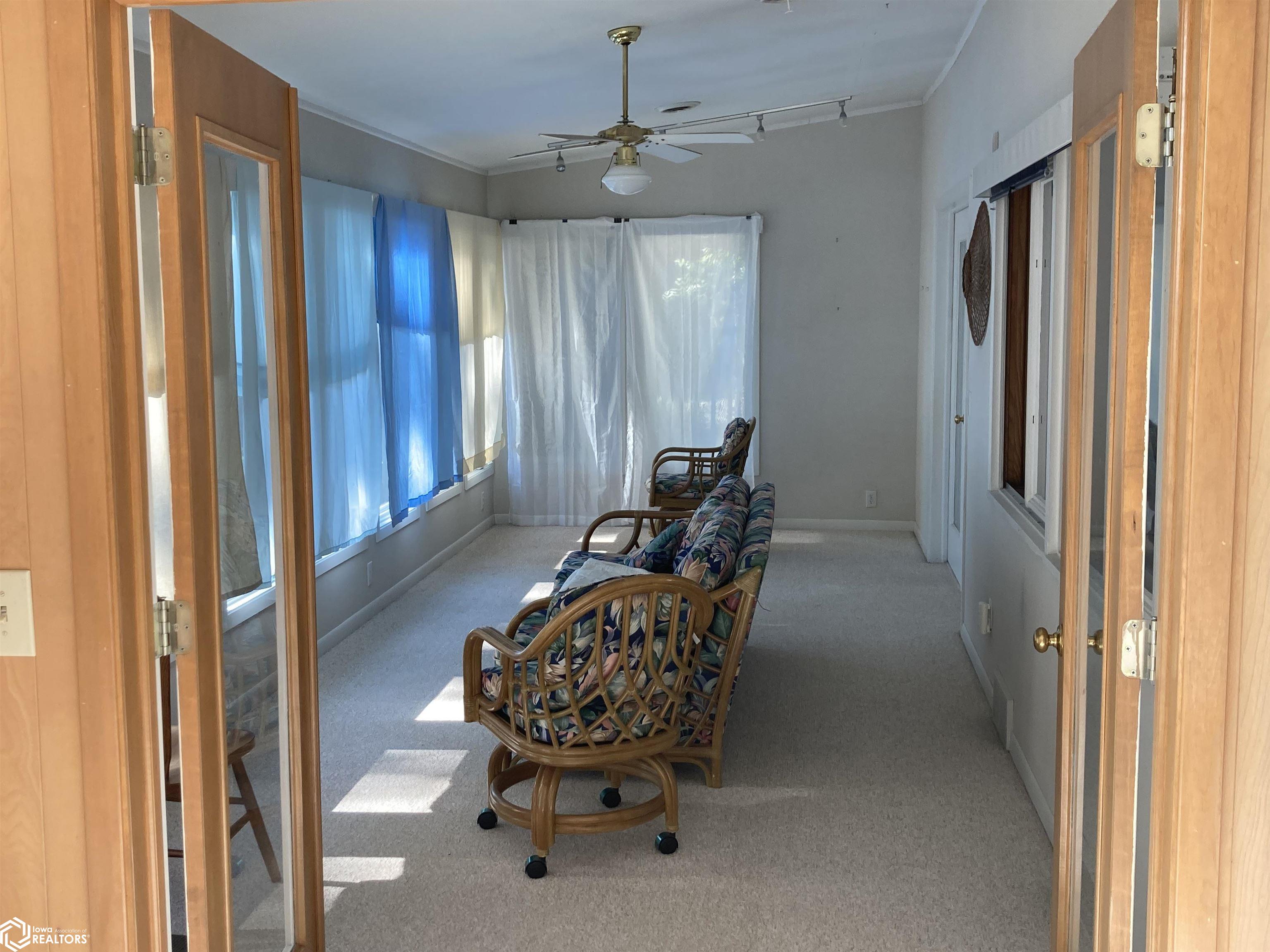 Southeast Sunroom With Window View To River.