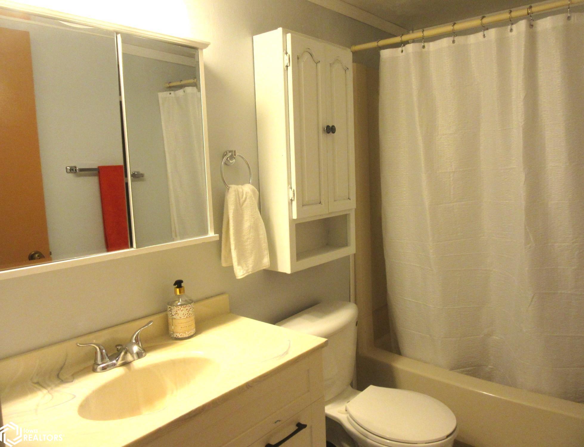 Updated vanity and stool, floors.