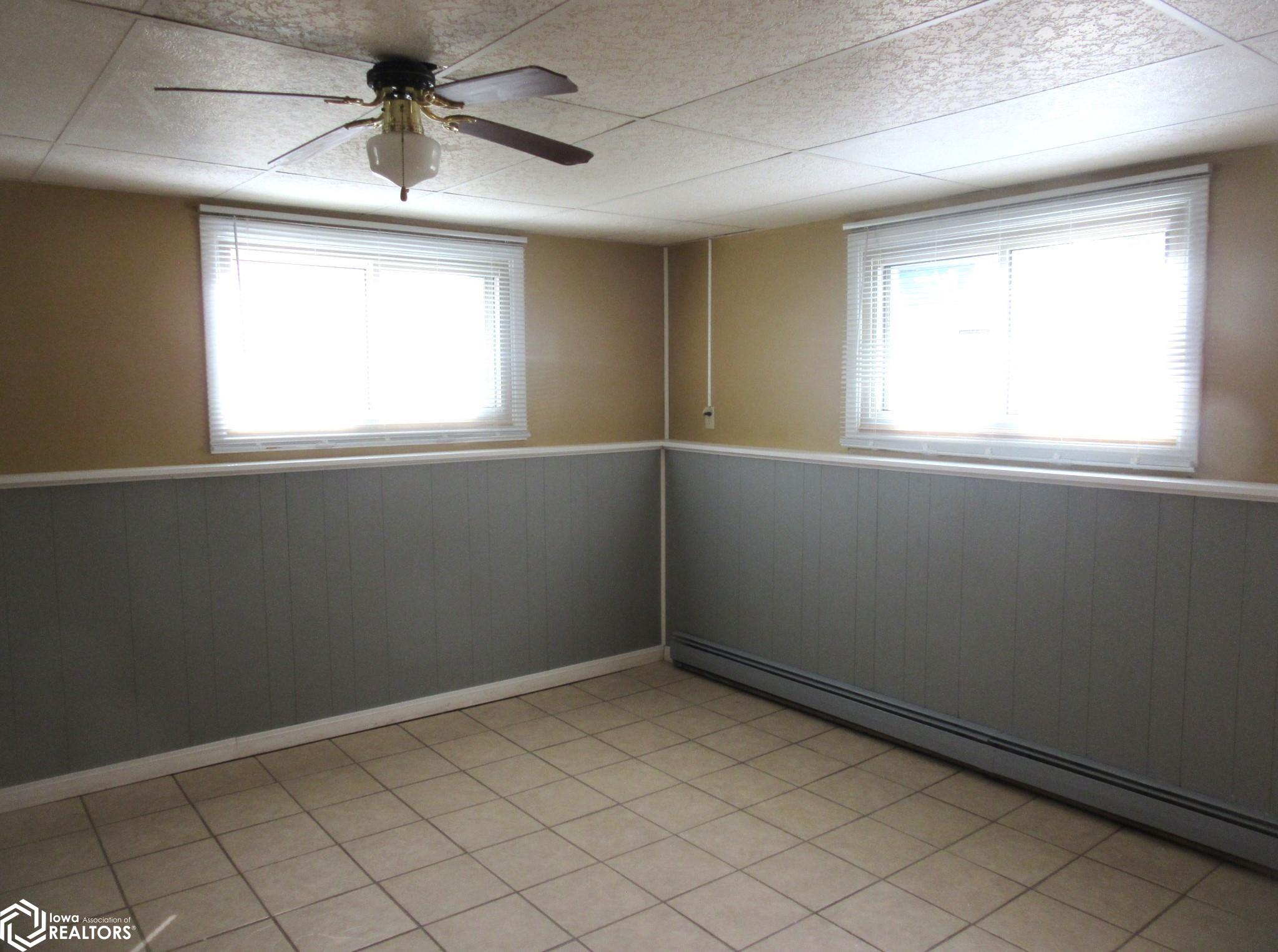 Spacious Family Room, multipurpose for many possibilities.   Ceramic Floors, natural light.