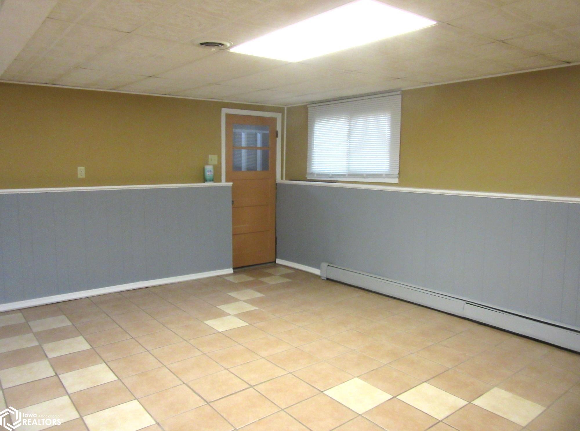 Balance of Family Room -- access to the garage.