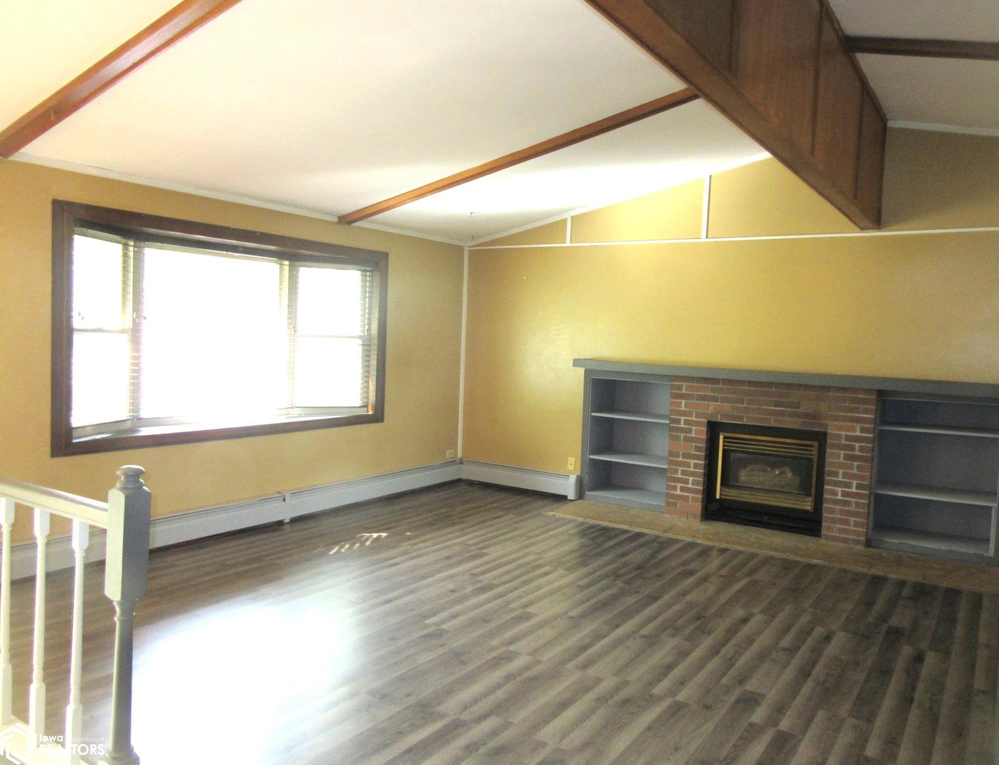 Spacious with Open ceilings and NG fireplace.