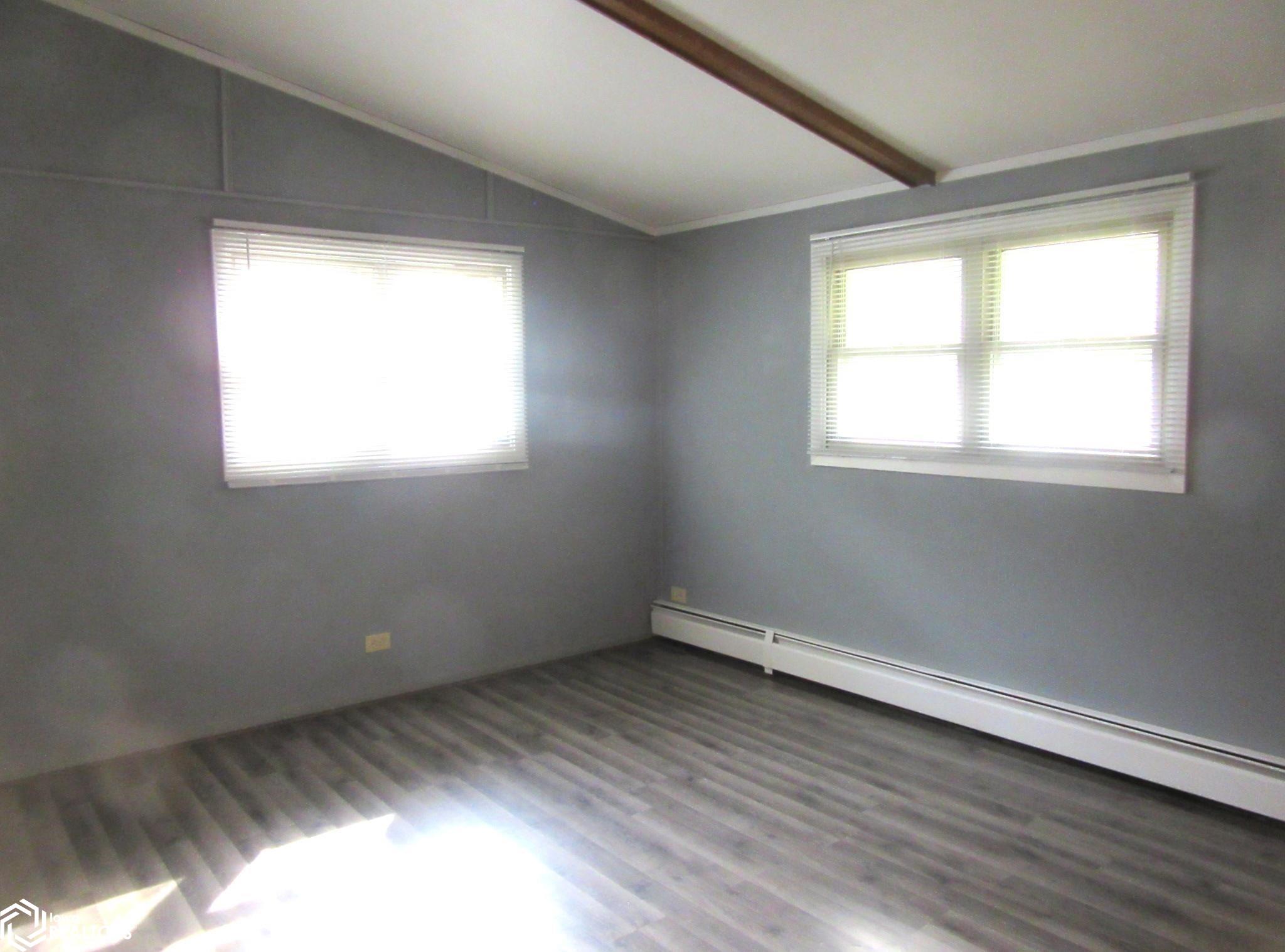 Bedroom on Main floor, with 2 closets and wonderful natural light