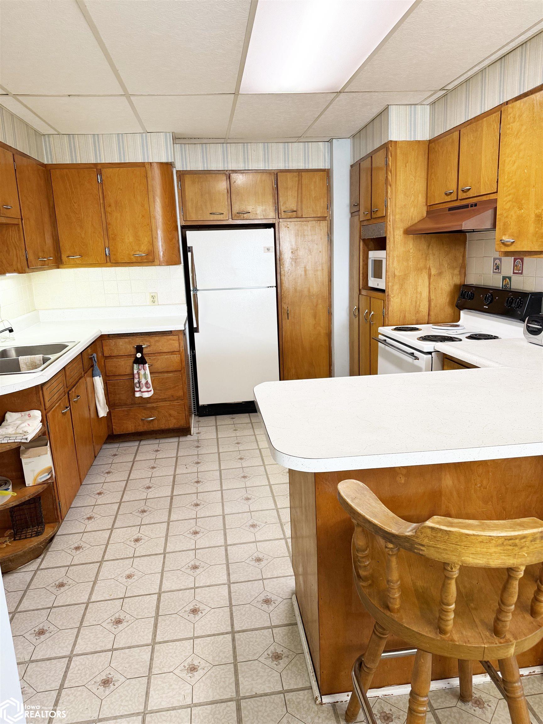 View of the kitchen looking N.