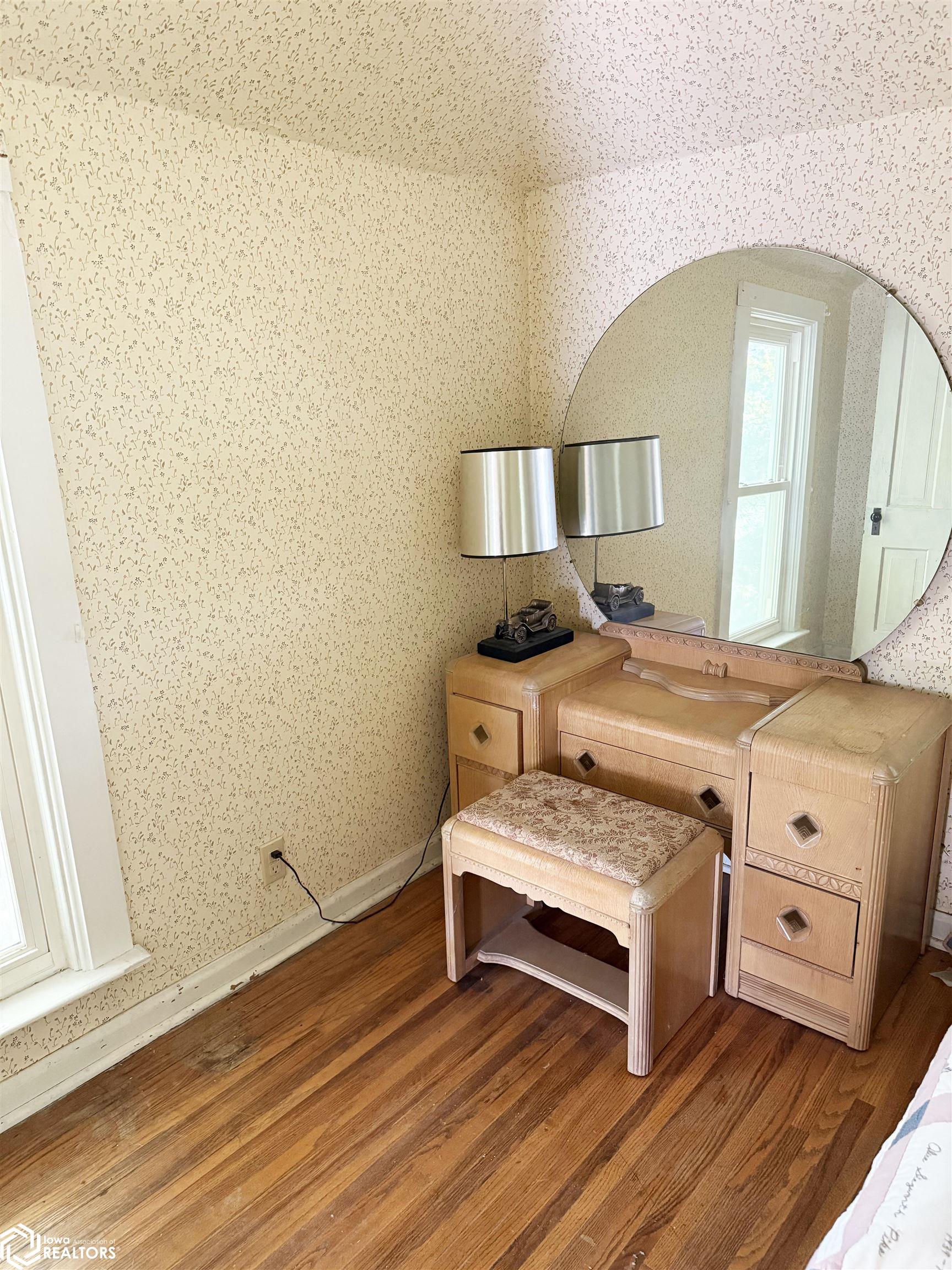 View of the large upstairs NW bedroom looking NW.