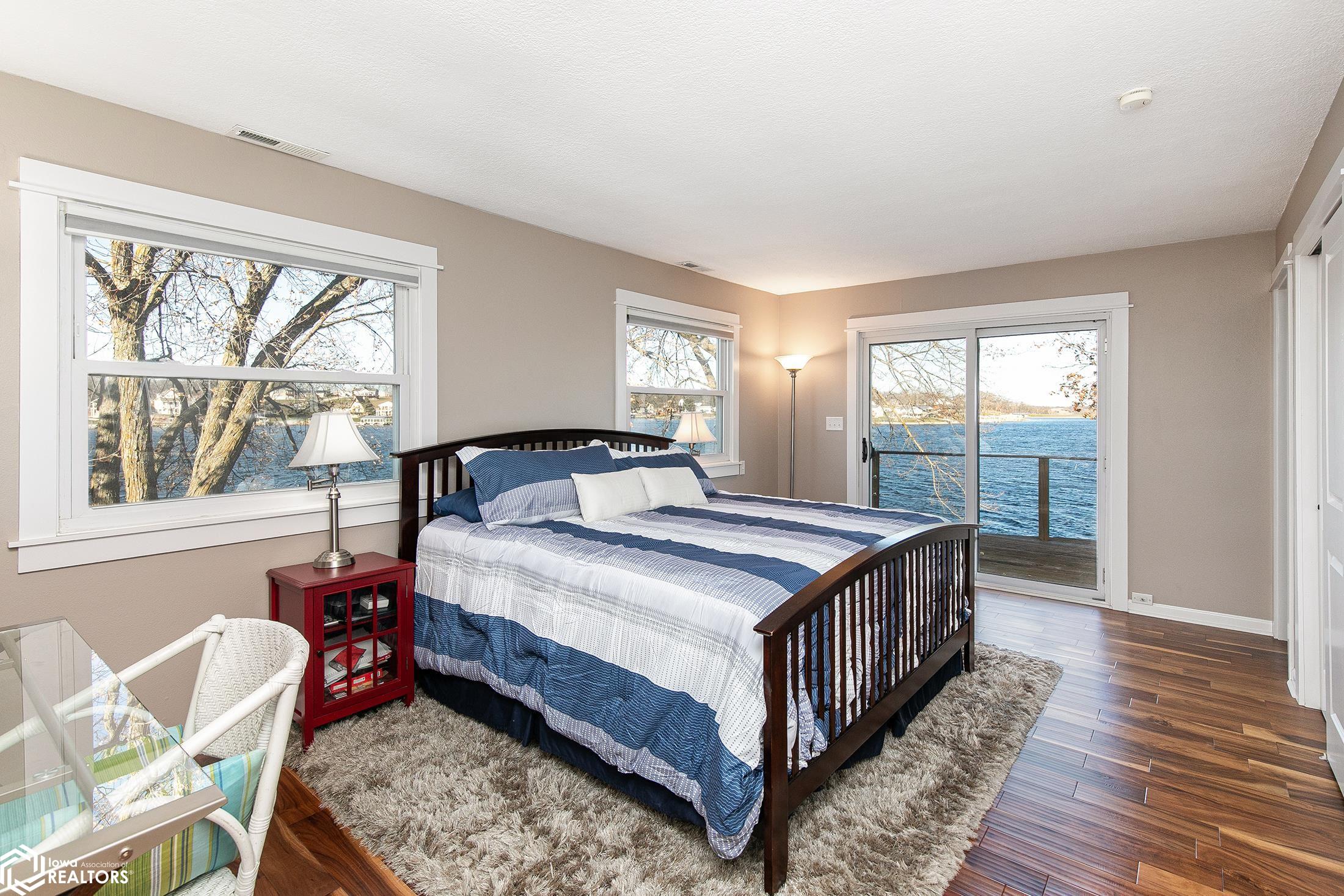 Primary bedroom has an exceptional of view of the lake