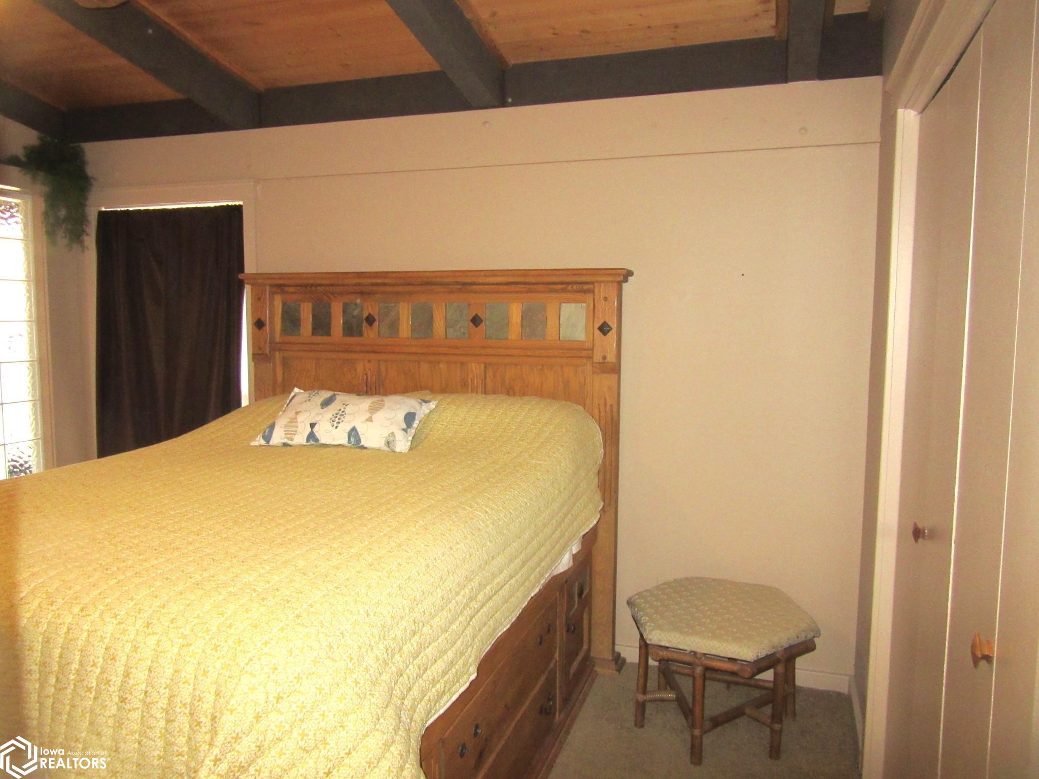 Bedroom, including bed.  Offers draws for storage under the bed.  (mattress not included.)