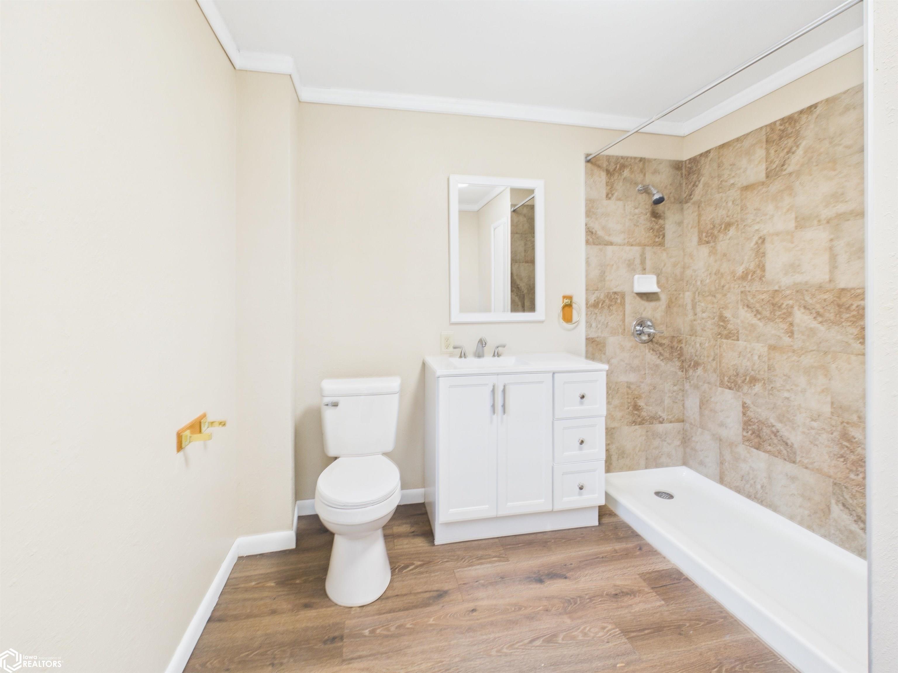 On the upper level. Has a walk-in shower.