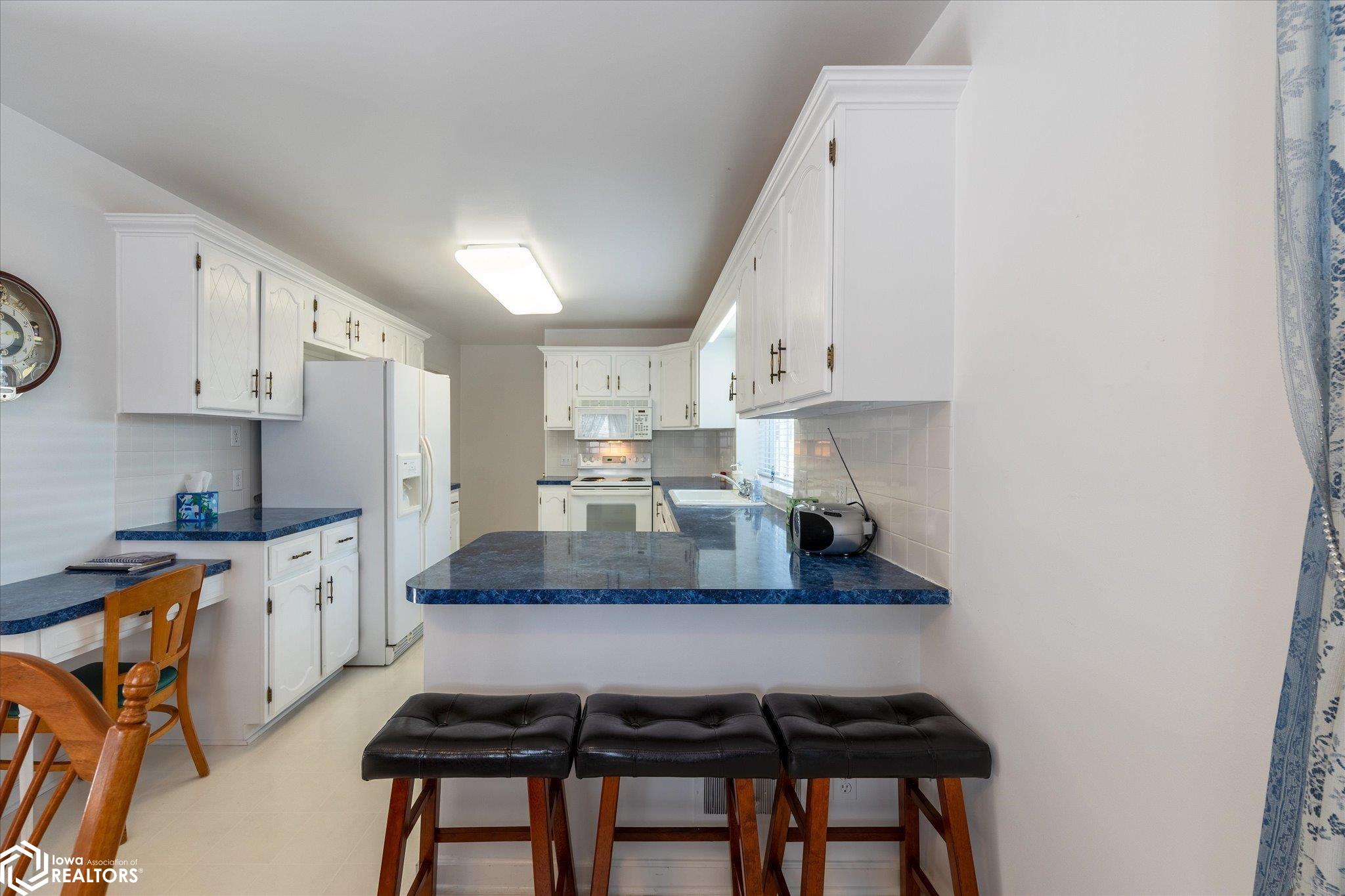 Looking North into the kitchen.