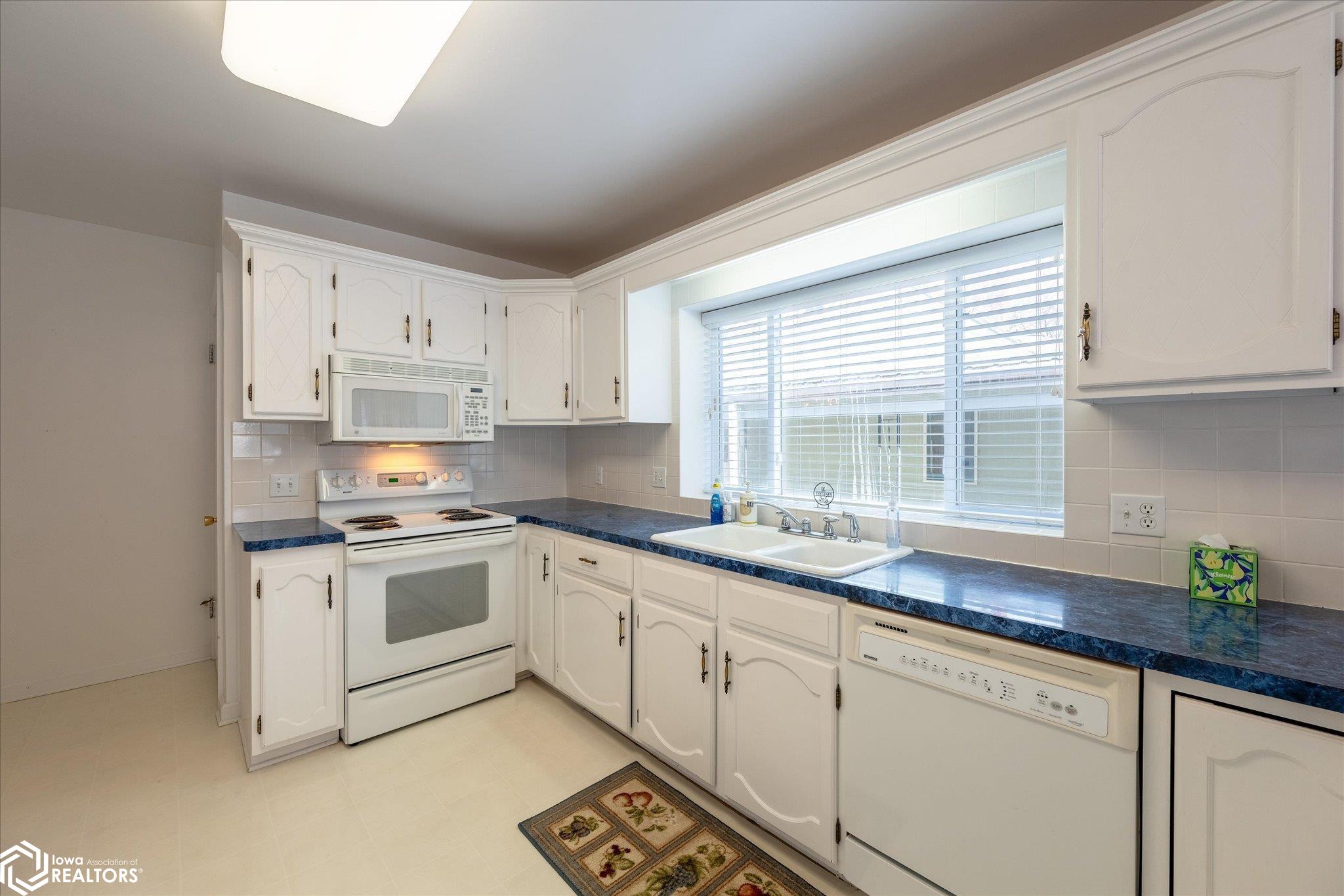 Looking North into the kitchen.