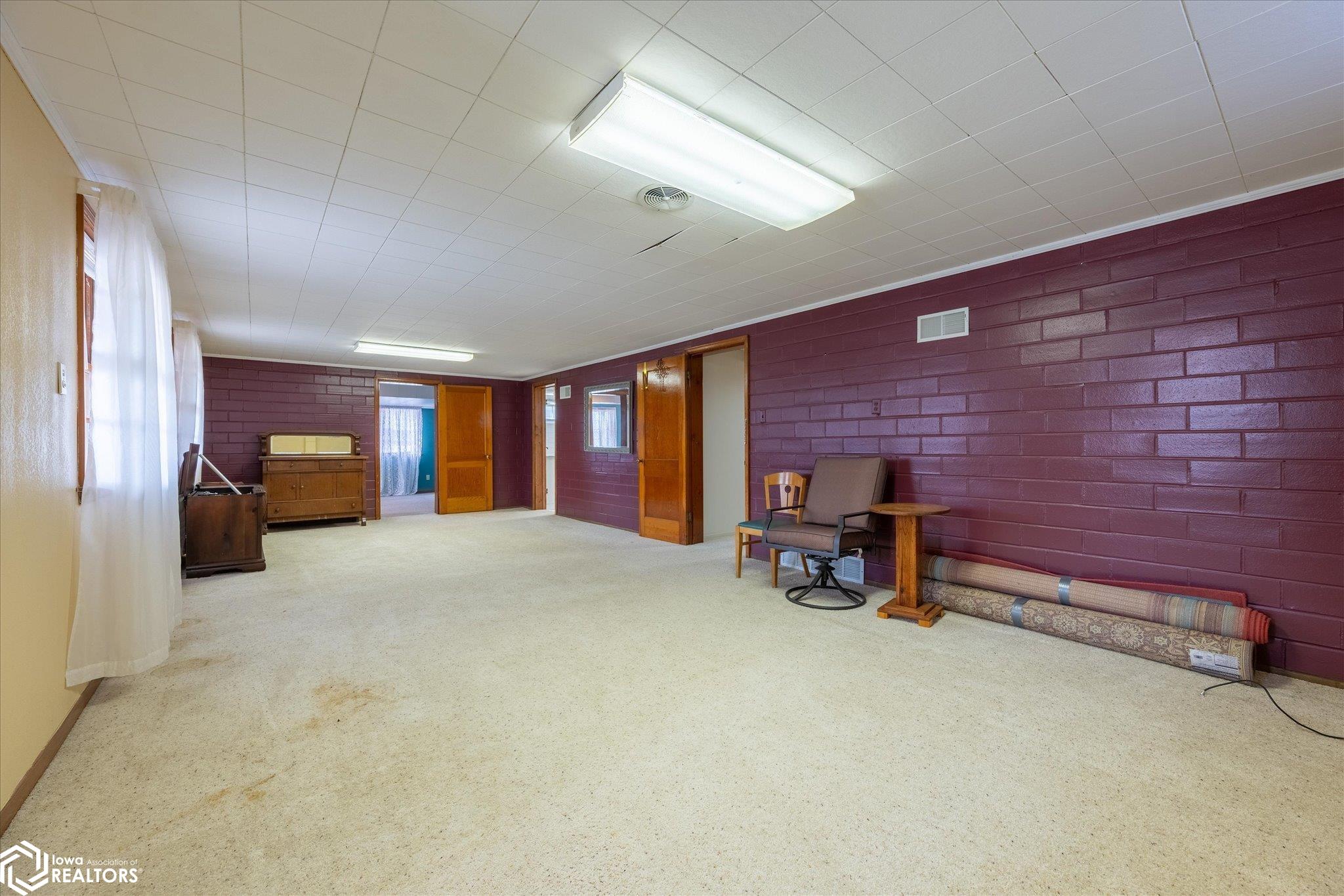 Looking west into the basement family room.