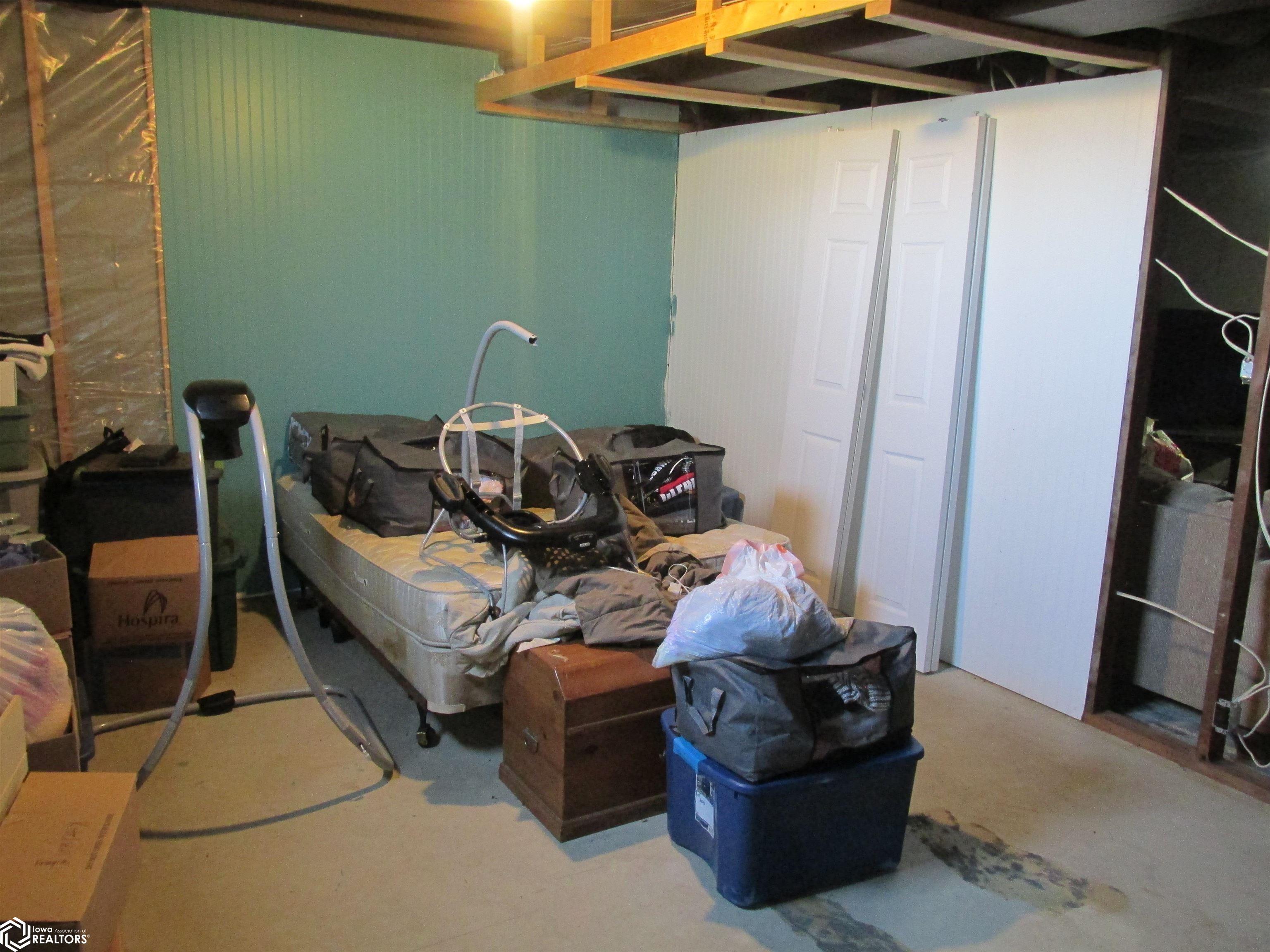 Potential non conforming Bedroom in the basement with majority of the walls up.