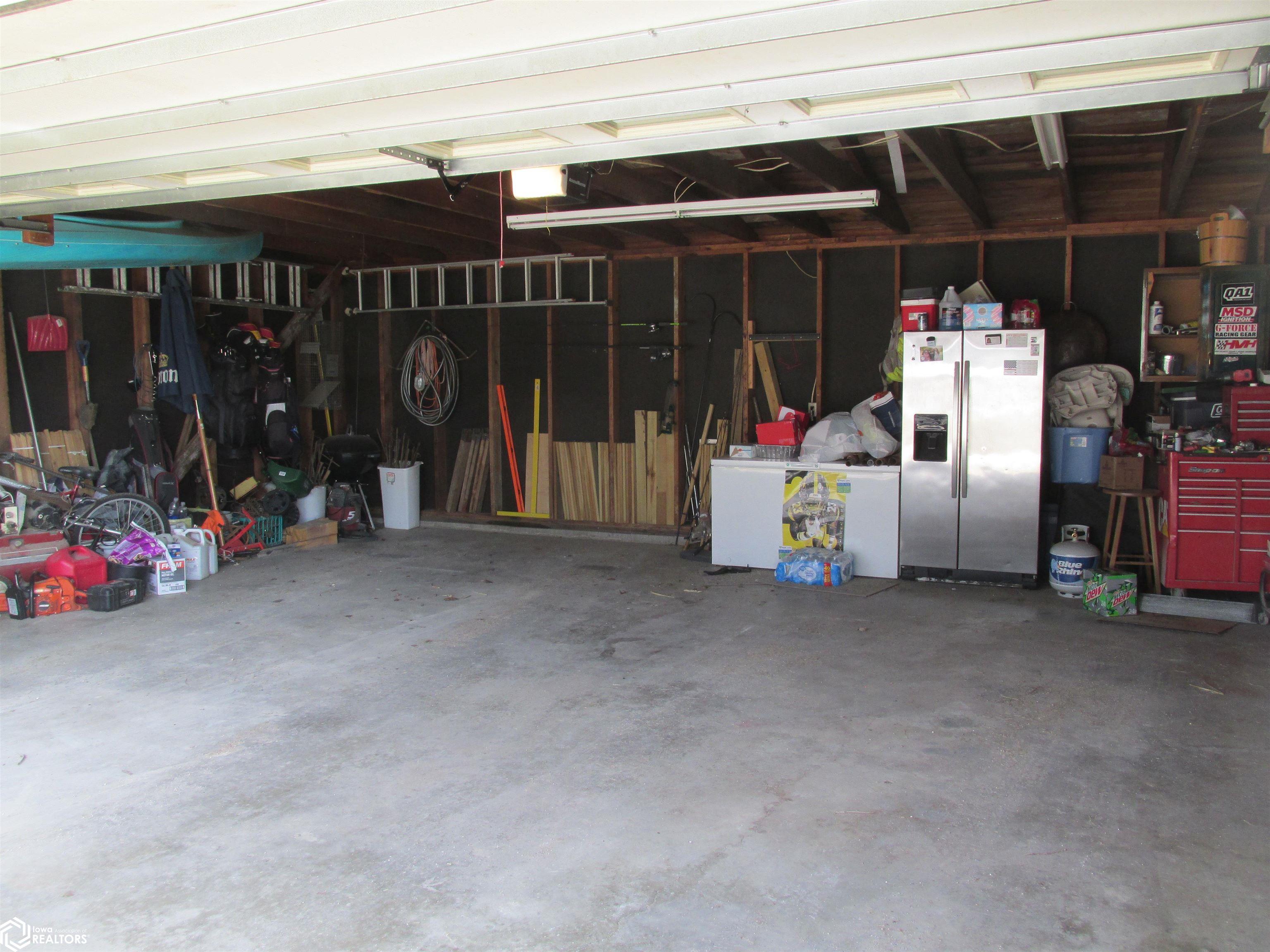 Extra large 2 car garage with lots of storage